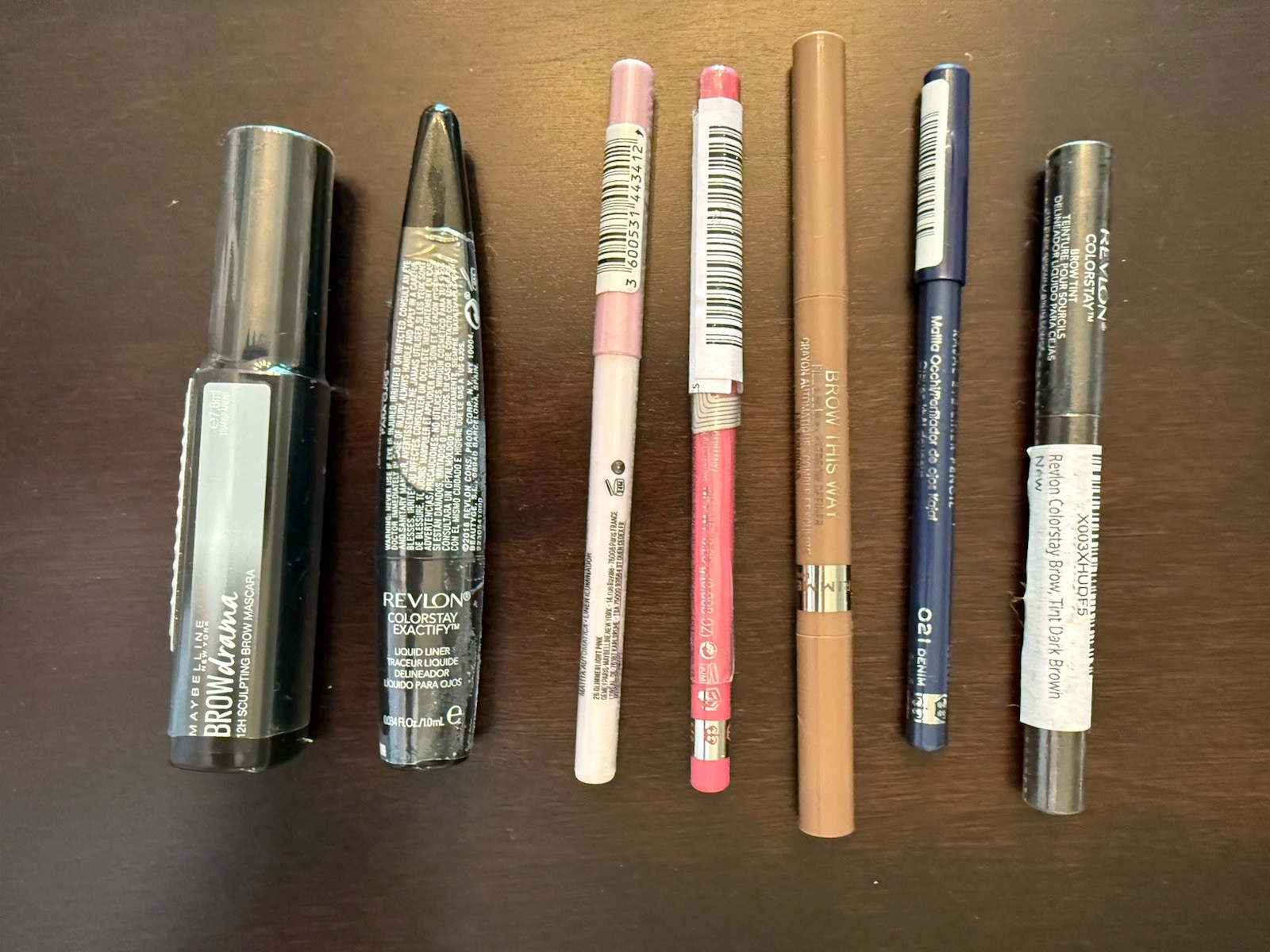 Makeup Lot of 7: Maybelline (2), Revlon (2), Rimmel (3).