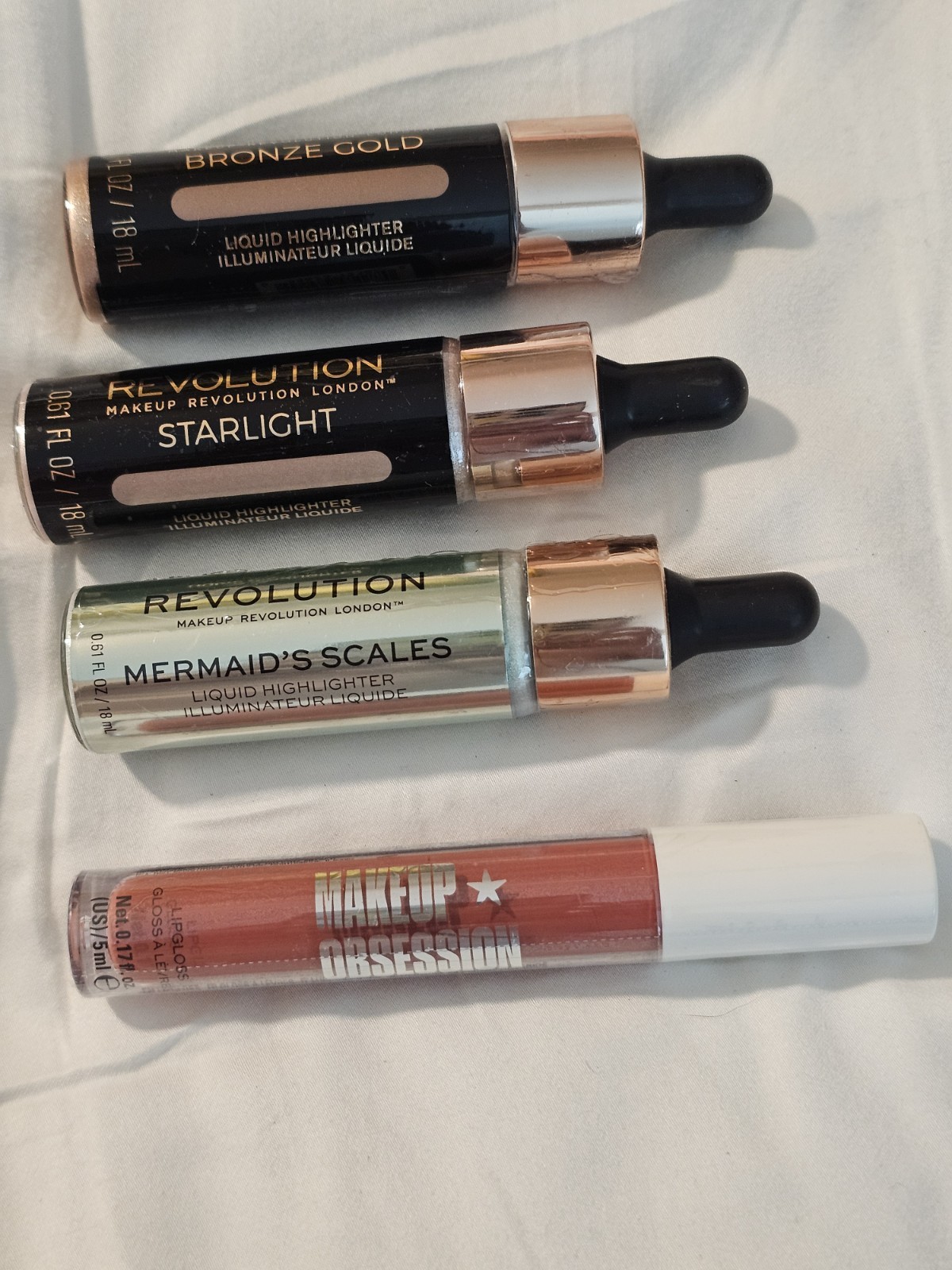 Makeup Revolution Liquid Highlighter & Lip Gloss Lot: Bronze Gold, Starlight