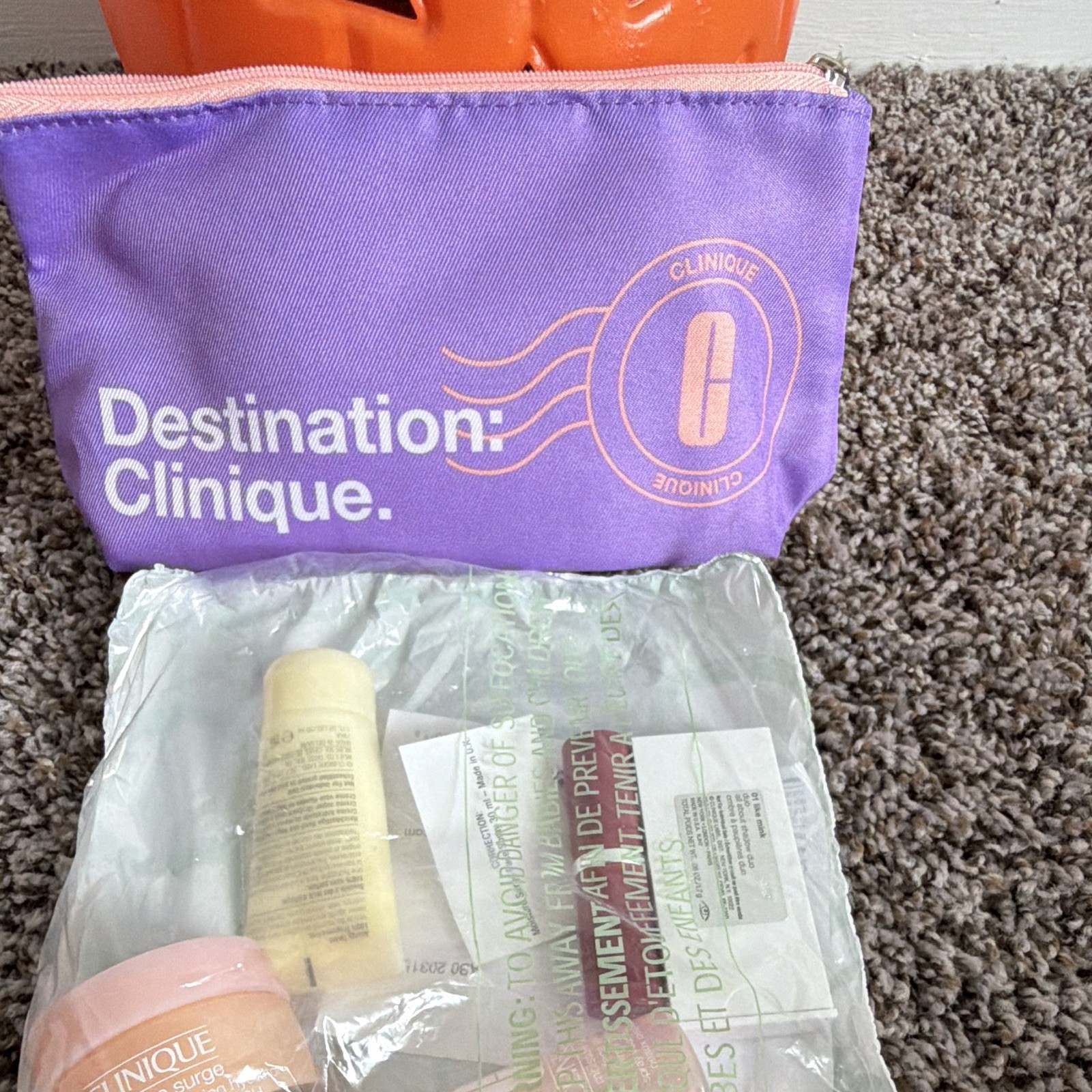 Clinique Destination: Clinique Purple Makeup Bag w/ Sample Size Mixed Lot