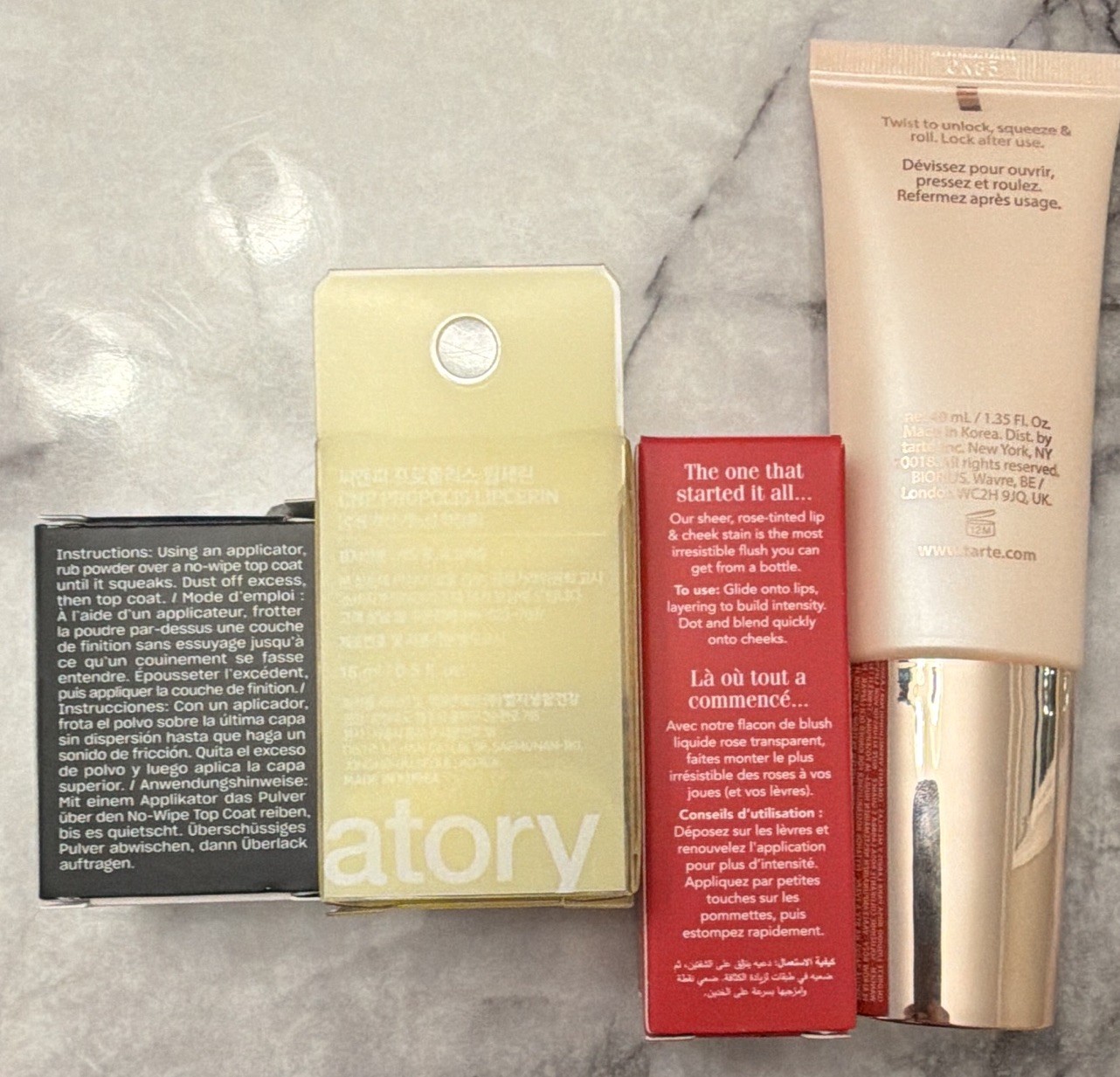 Assorted Makeup Lot: OPI Chrome Effects, CNP Lipcerin, Benetint, Tarte Base