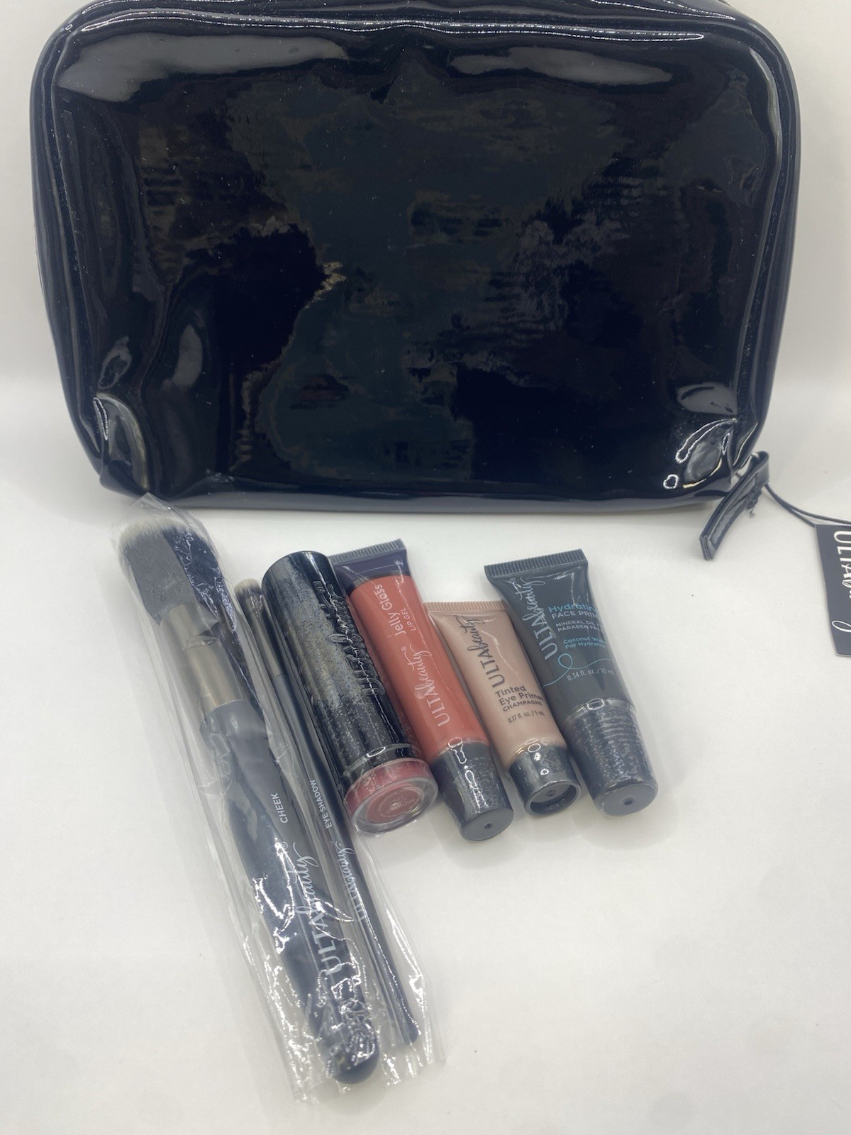 ULTA Beauty 7-Piece Makeup Lot Set w/ Cosmetic Bag Brushes Lipstick Primers