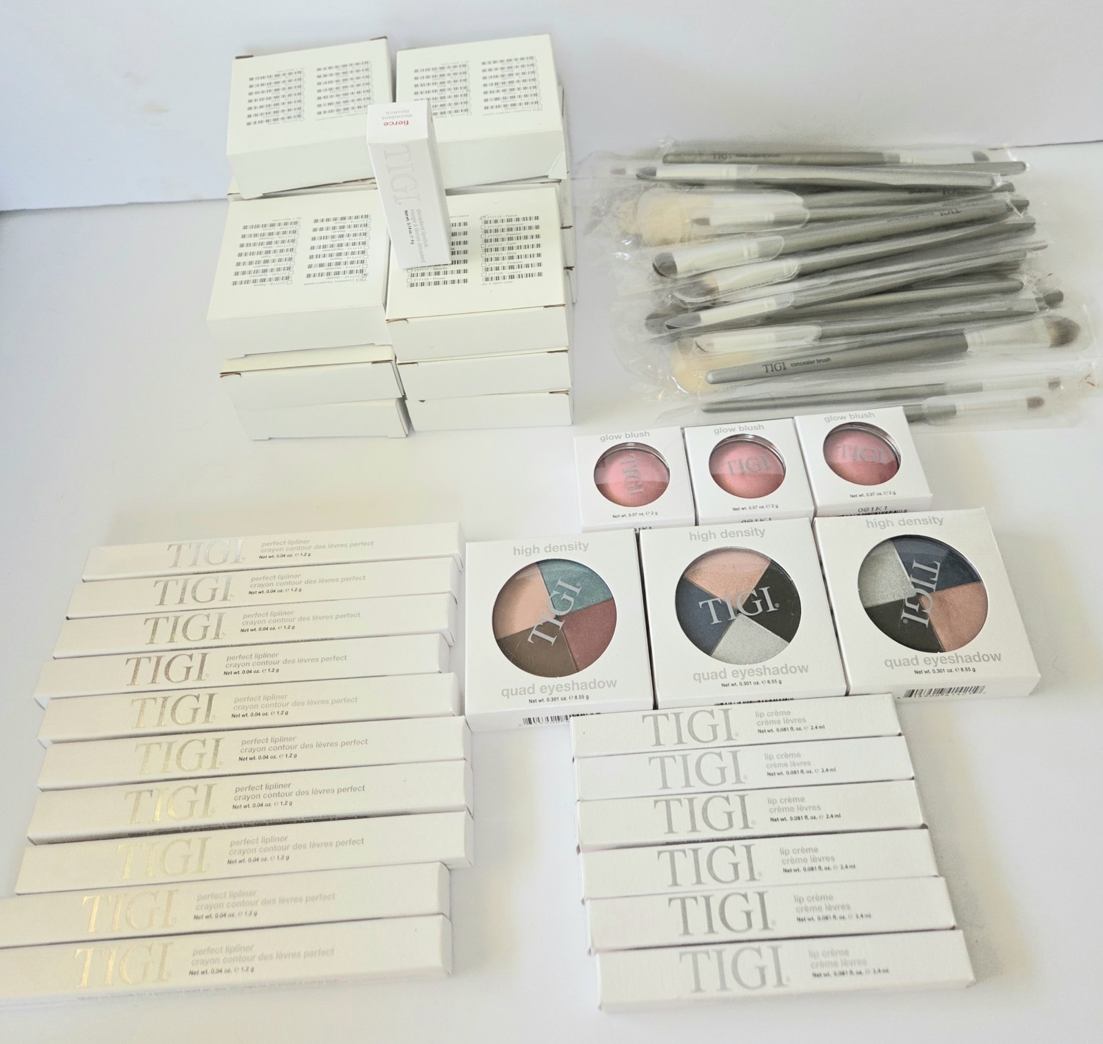 LOT OF 85 TIGI COSMETICS, LIPSTICK, LIPLINER, BLUSH, EYESHADOW, BRUSHES, NIB