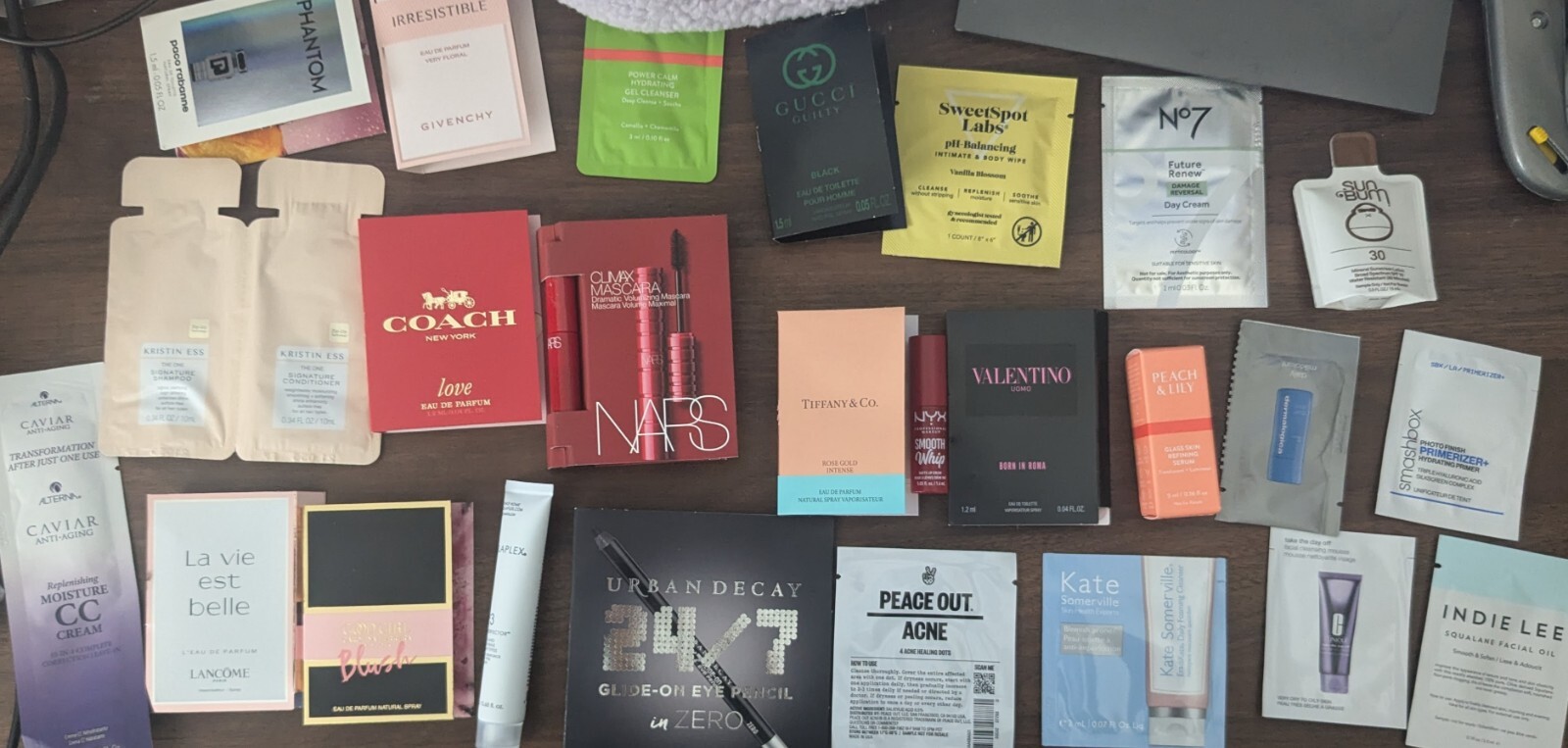 25-PIECE MAKEUP, PERFUM, AND SKINCARE ASSORTMENT WITH CUTE BAG