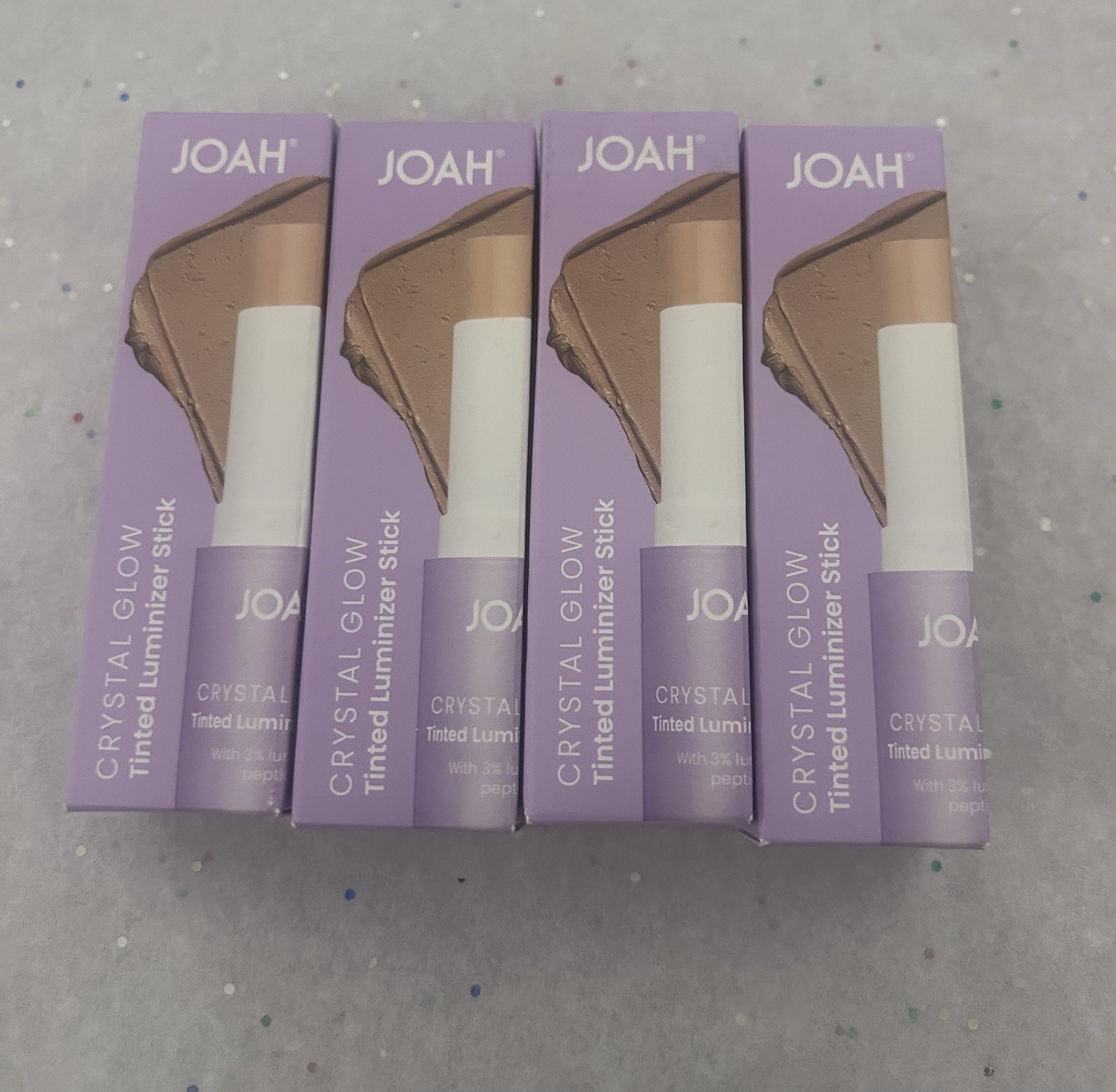 4 Joah crystal glow tinted luminizer stick MW020