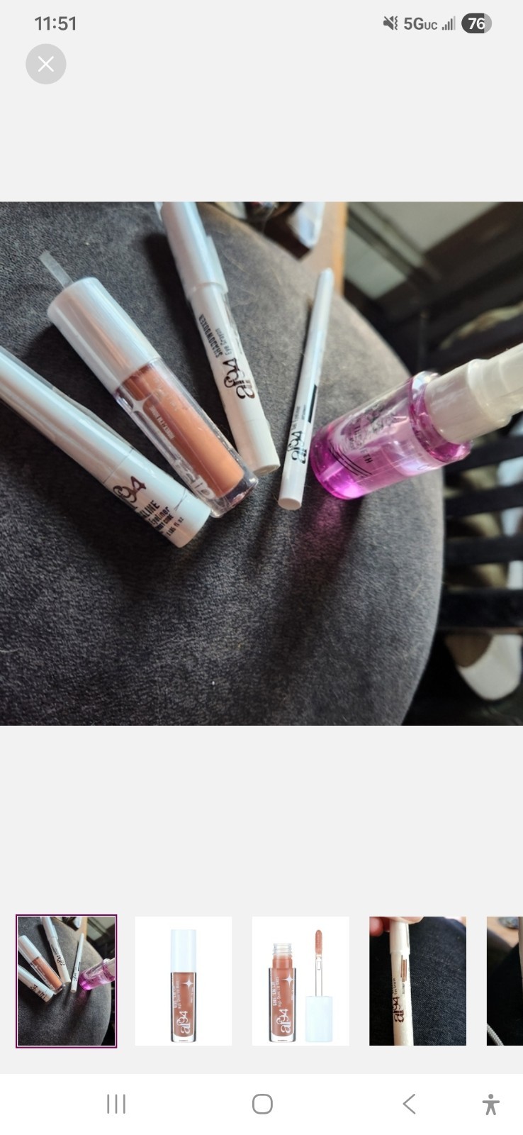 Mixed Lot of 25 pieces of Diffrent Brand makeup with a black makeup bag.
