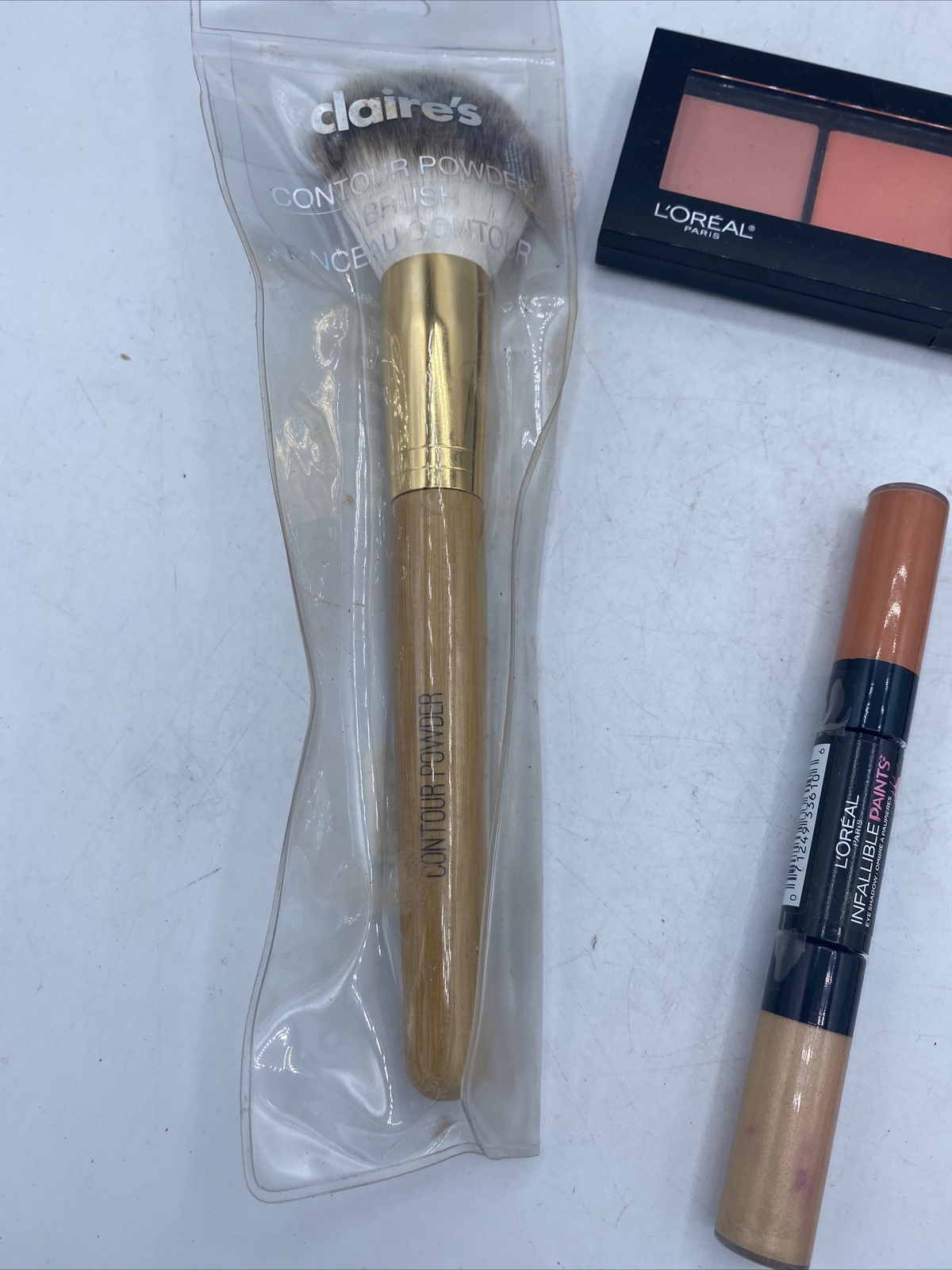 4 Piece Makeup Lot L’Oreal Including Eyeliner Pencil , Blush, Eyeshadow & Brush