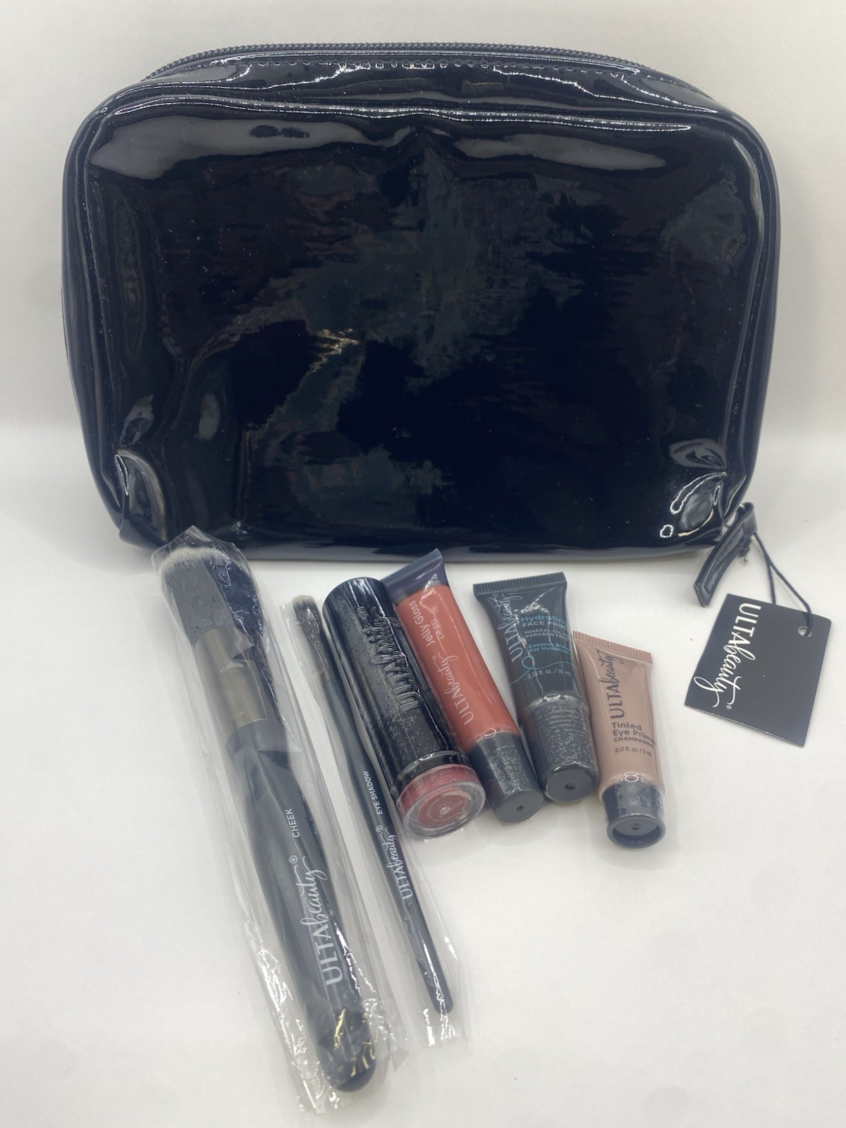 ULTA Beauty 7-Piece Makeup Lot Set w/ Cosmetic Bag Brushes Lipstick Primers