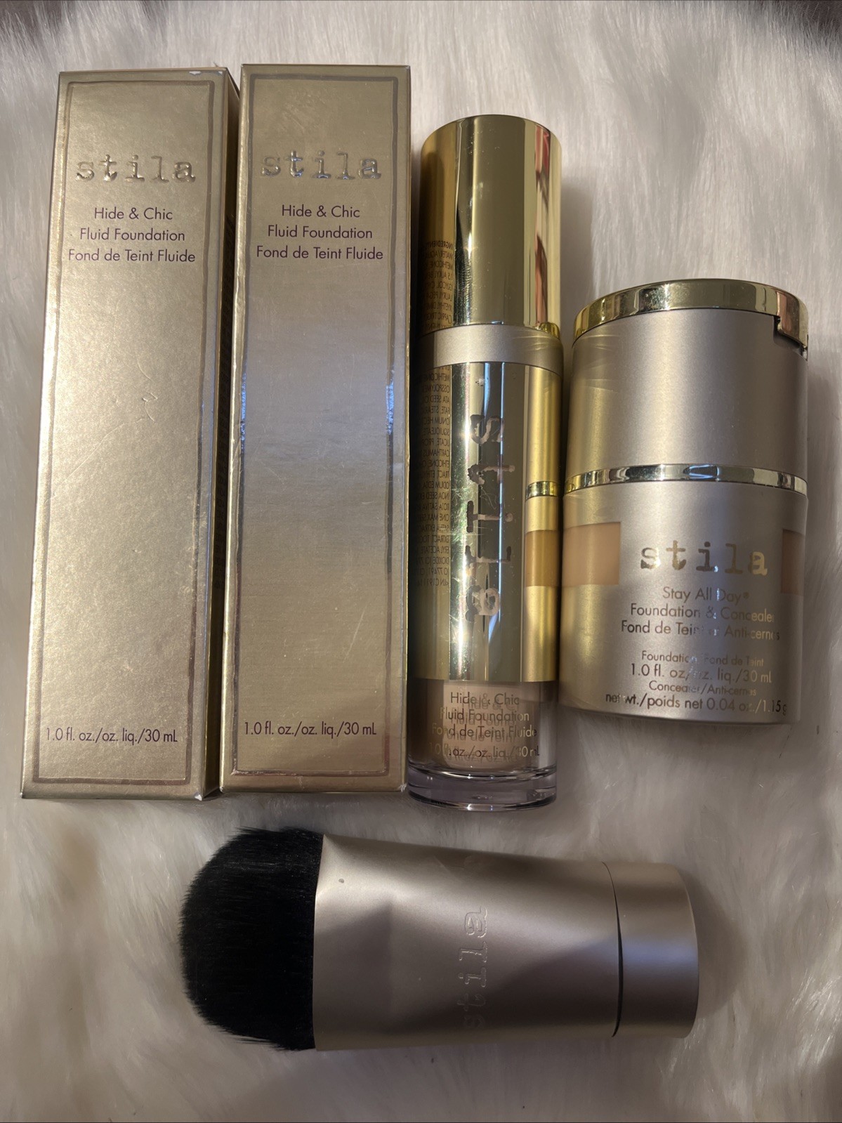mixed make up lot Stila: Foundation, Concealer, Brush CHECK DESCRIPTION