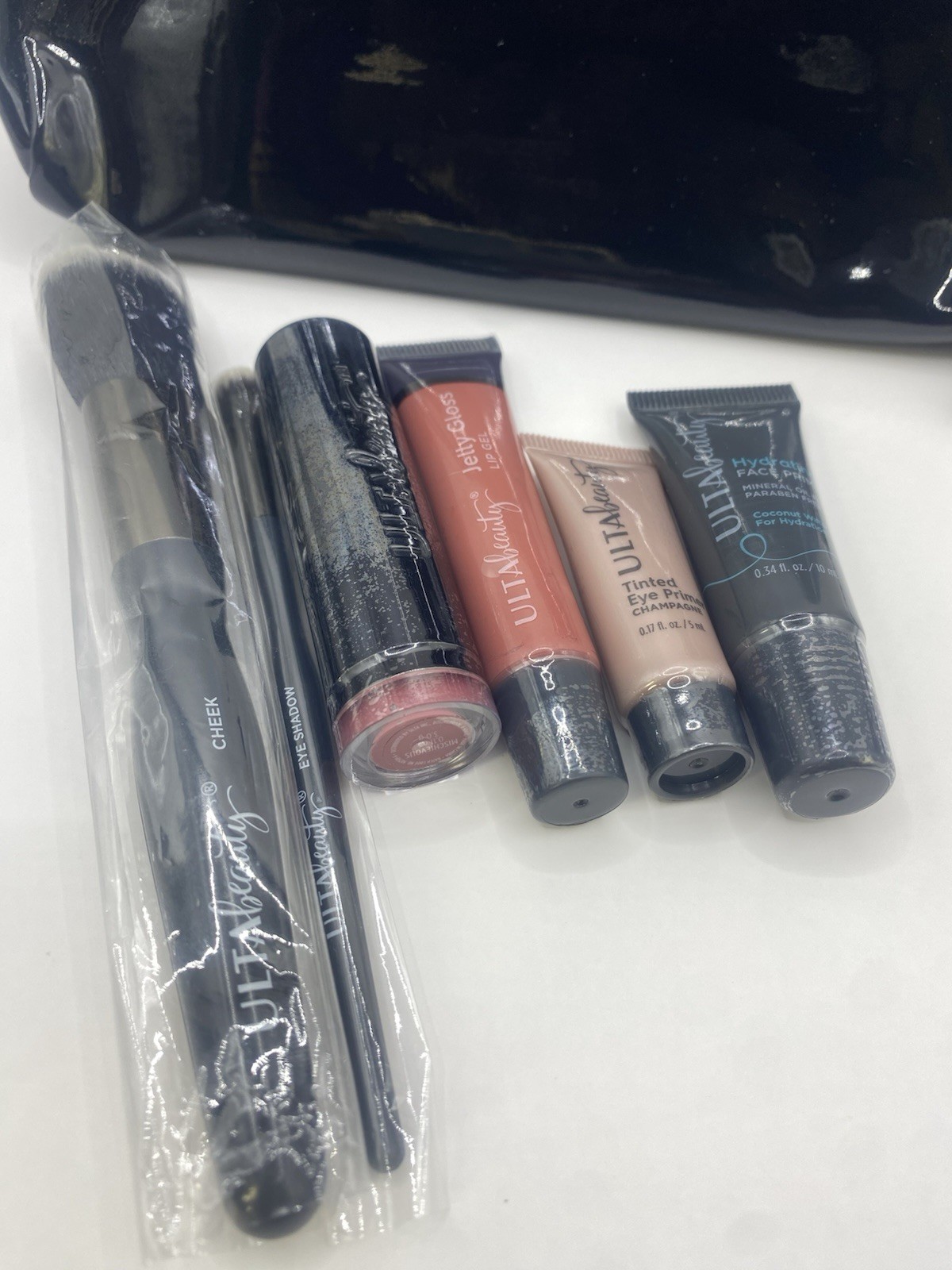 ULTA Beauty 7-Piece Makeup Lot Set w/ Cosmetic Bag Brushes Lipstick Primers