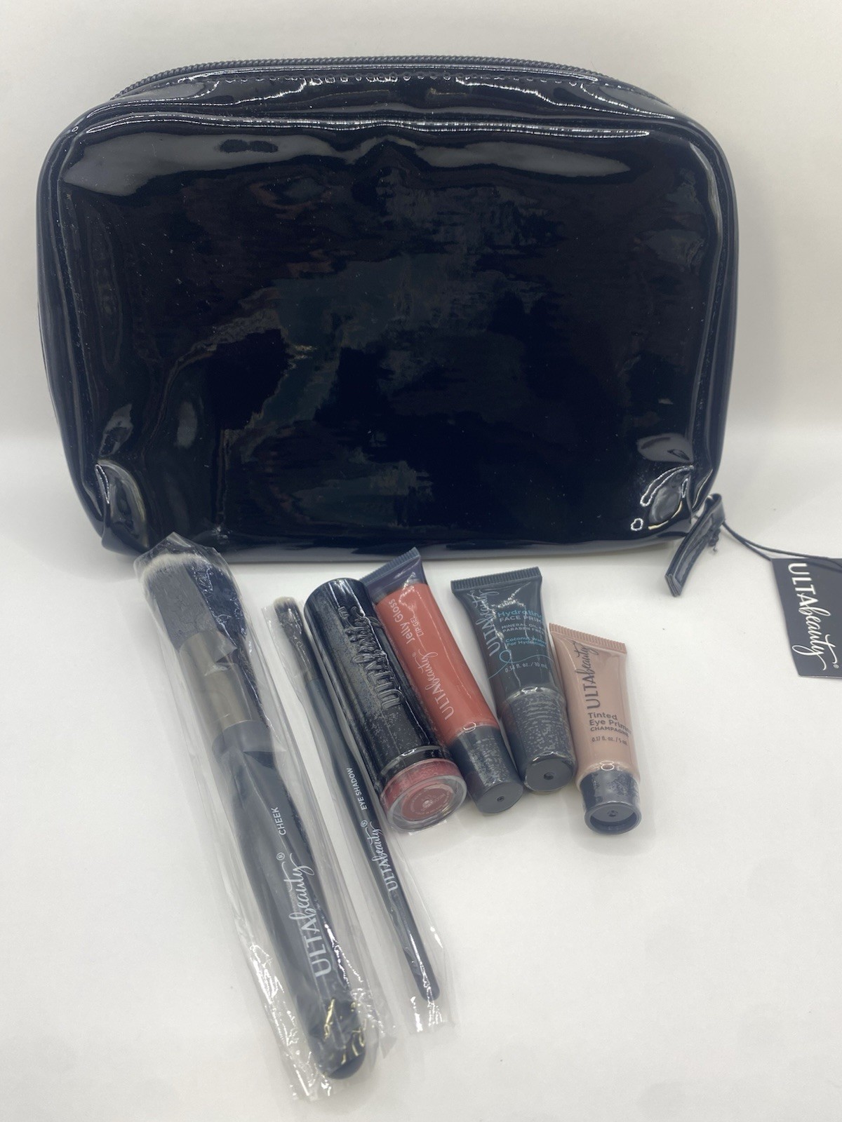 ULTA Beauty 7-Piece Makeup Lot Set w/ Cosmetic Bag Brushes Lipstick Primers