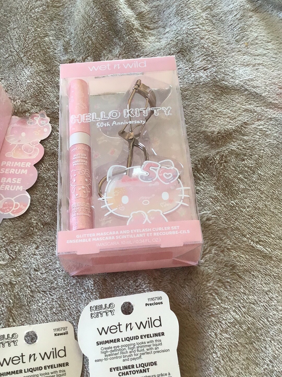 Hello Kitty Holidays 10 Pcs Set Wet n Wild Eyeliner Lip Mask Oil Primer Sponge