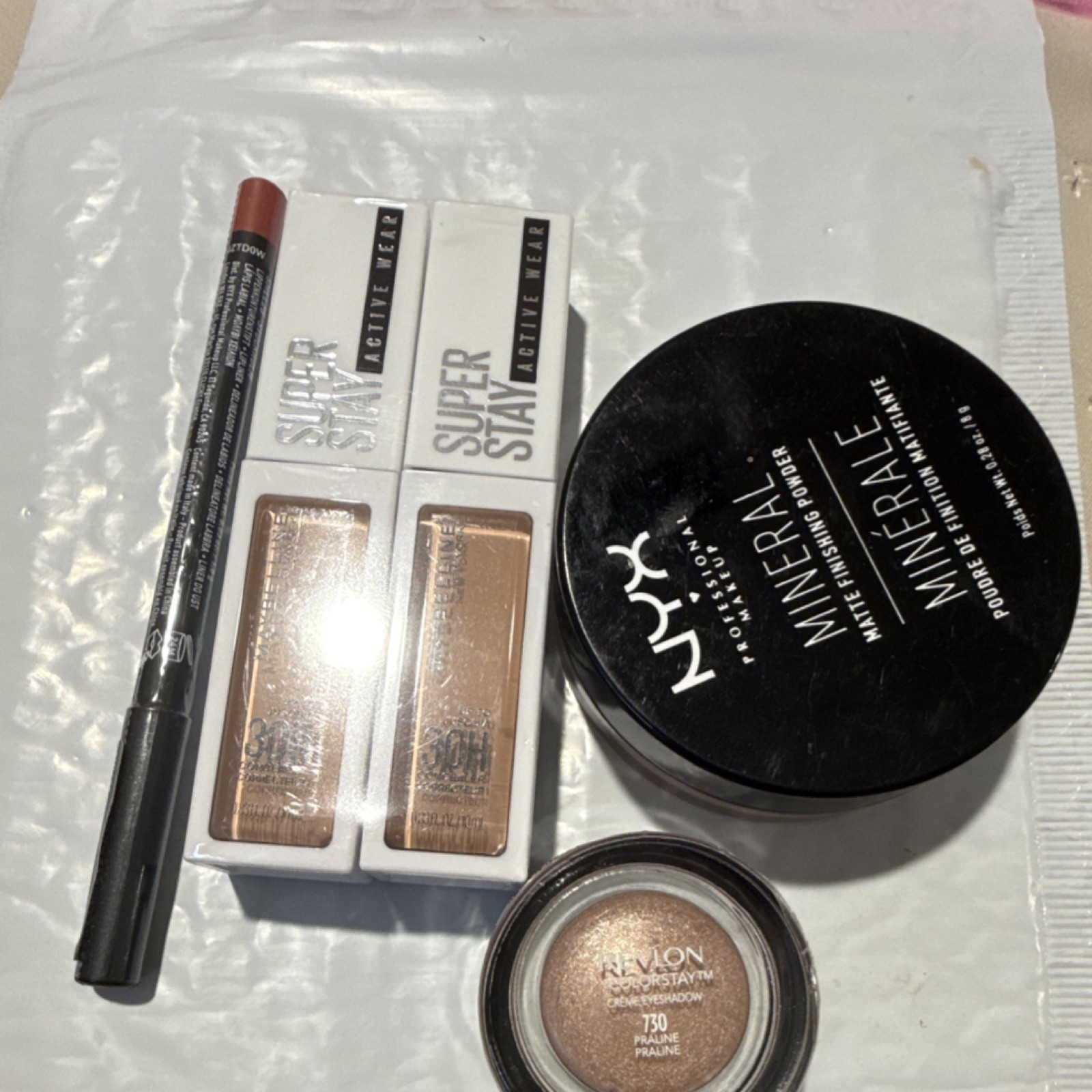 Maybelline Super Stay Concealer, NYX Mineral Powder, Revlon ColorStay Eyeshadow