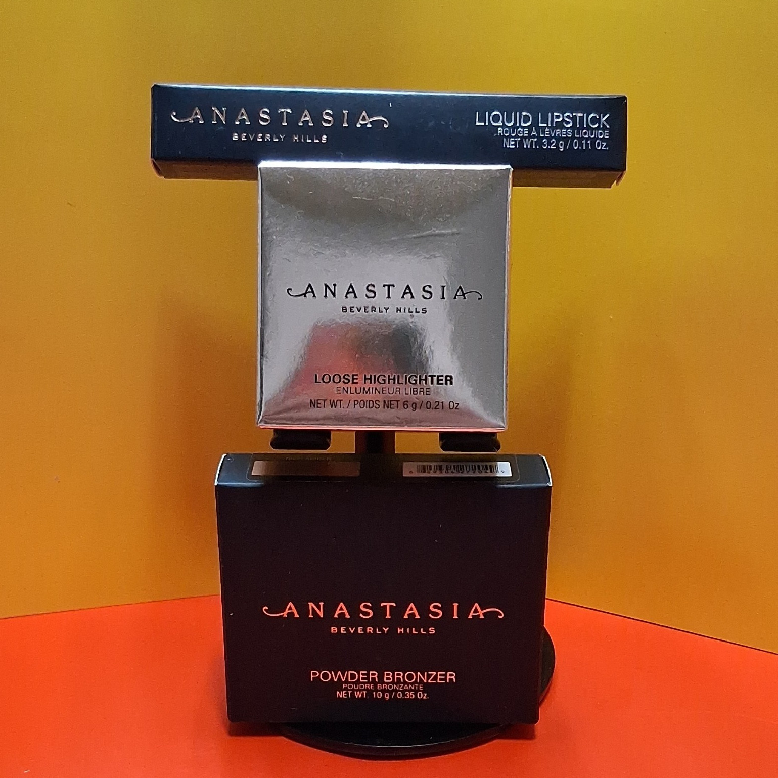 Anastasia Beverly Hills Lipstick Requiem, Highlighter Vegas, Bronzer Rich Amber