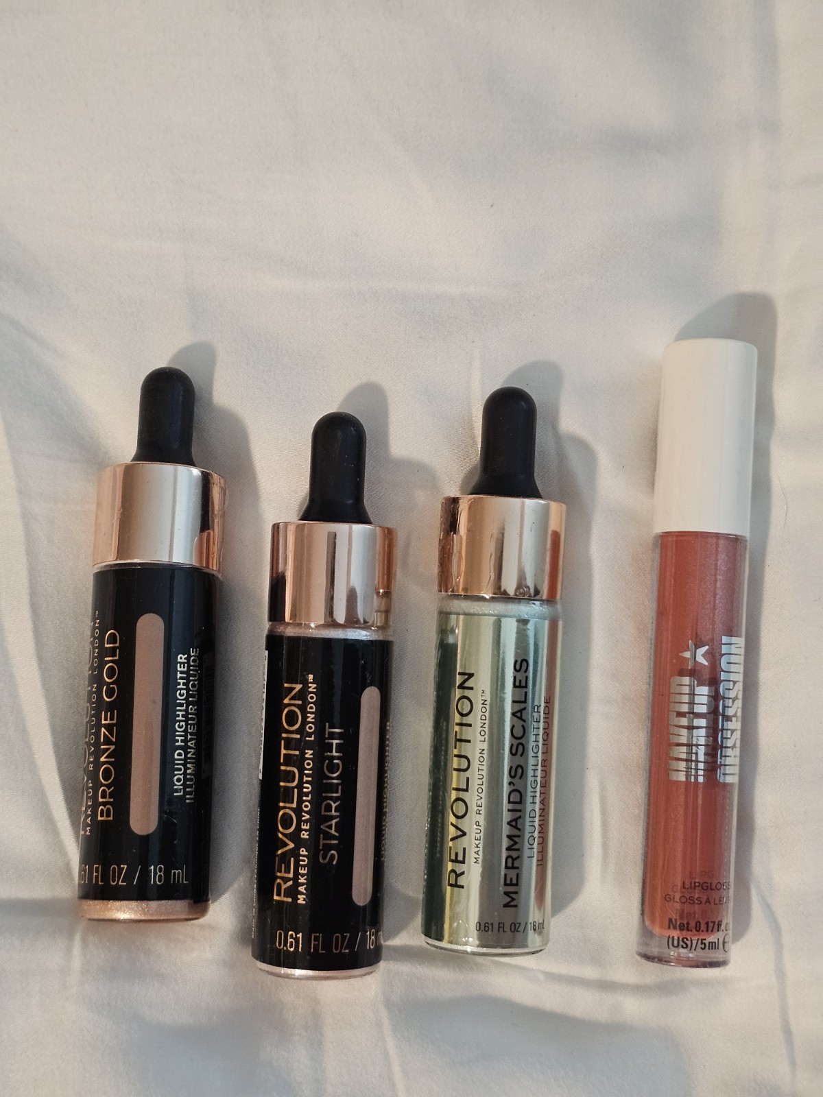 Makeup Revolution Liquid Highlighter & Lip Gloss Lot: Bronze Gold, Starlight