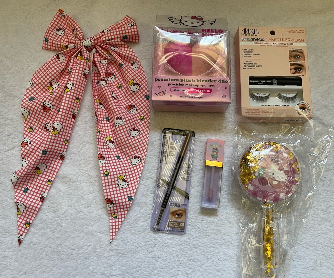 Hello Kitty Beauty lot! Crème shop blender, Bow, lip gloss, Hair Brush, lashes