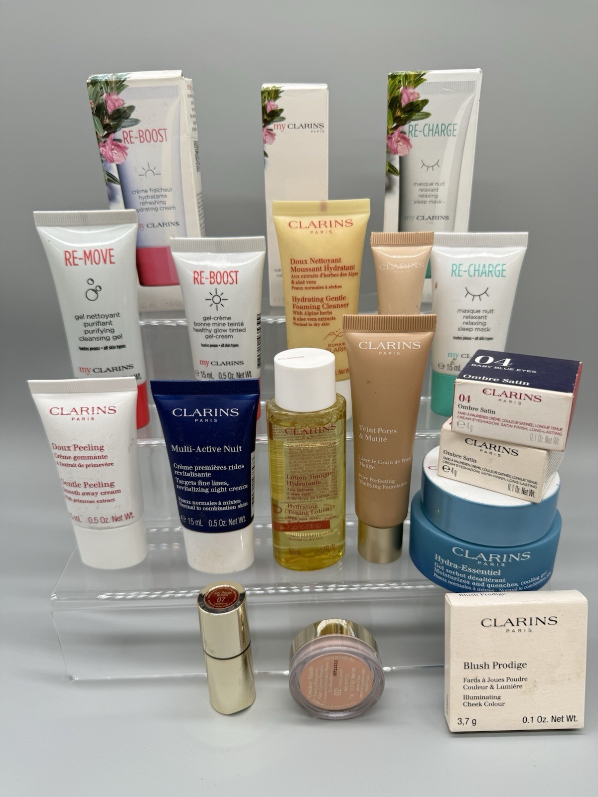 WHOLESALE LOT OF 63 MIXED/ASSORTED CLARINS PARIS BEAUTY PRODUCTS