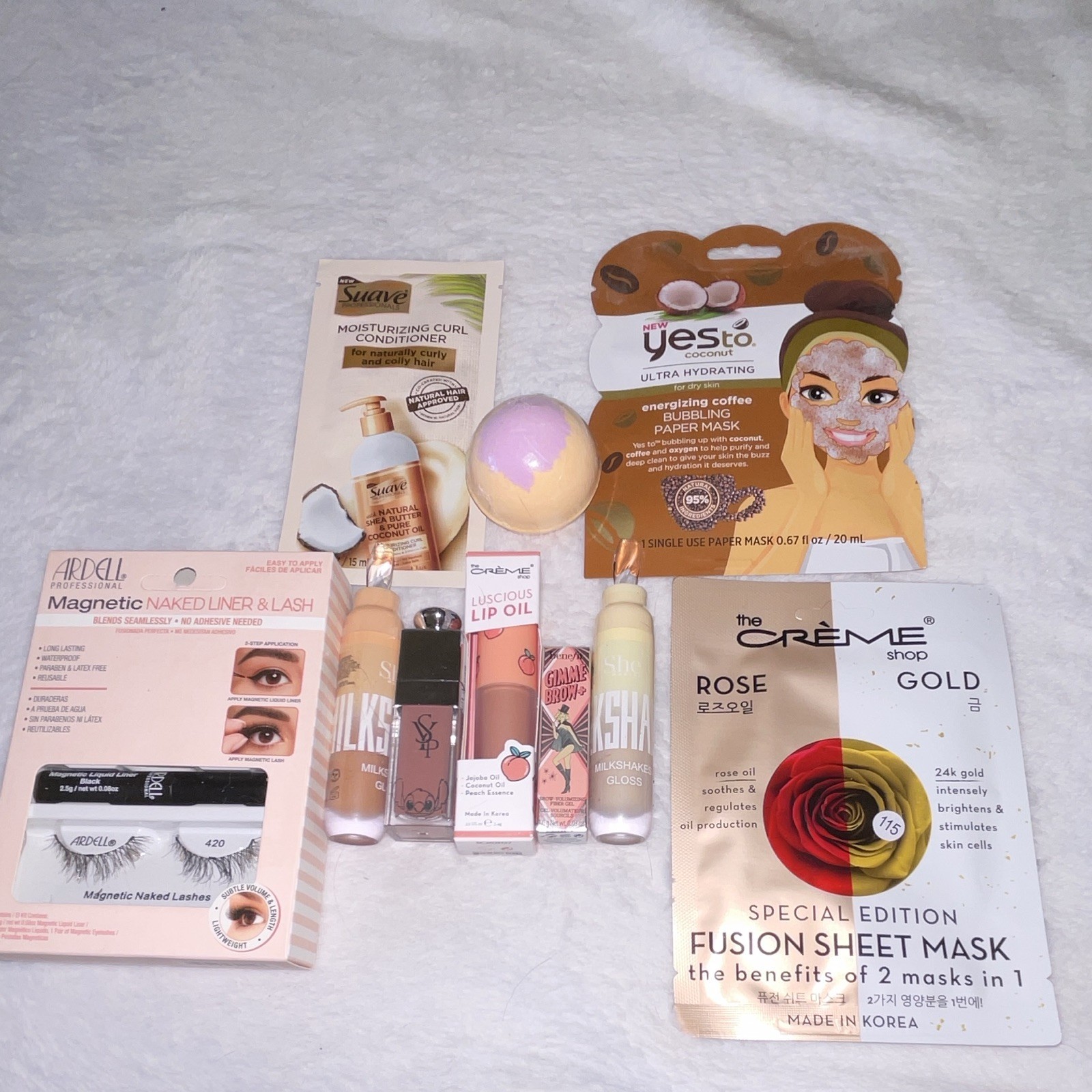 Beauty Lot Ardell Magnetic Lash, Gimme Brow, the Crème shop Mask, lip gloss Milk