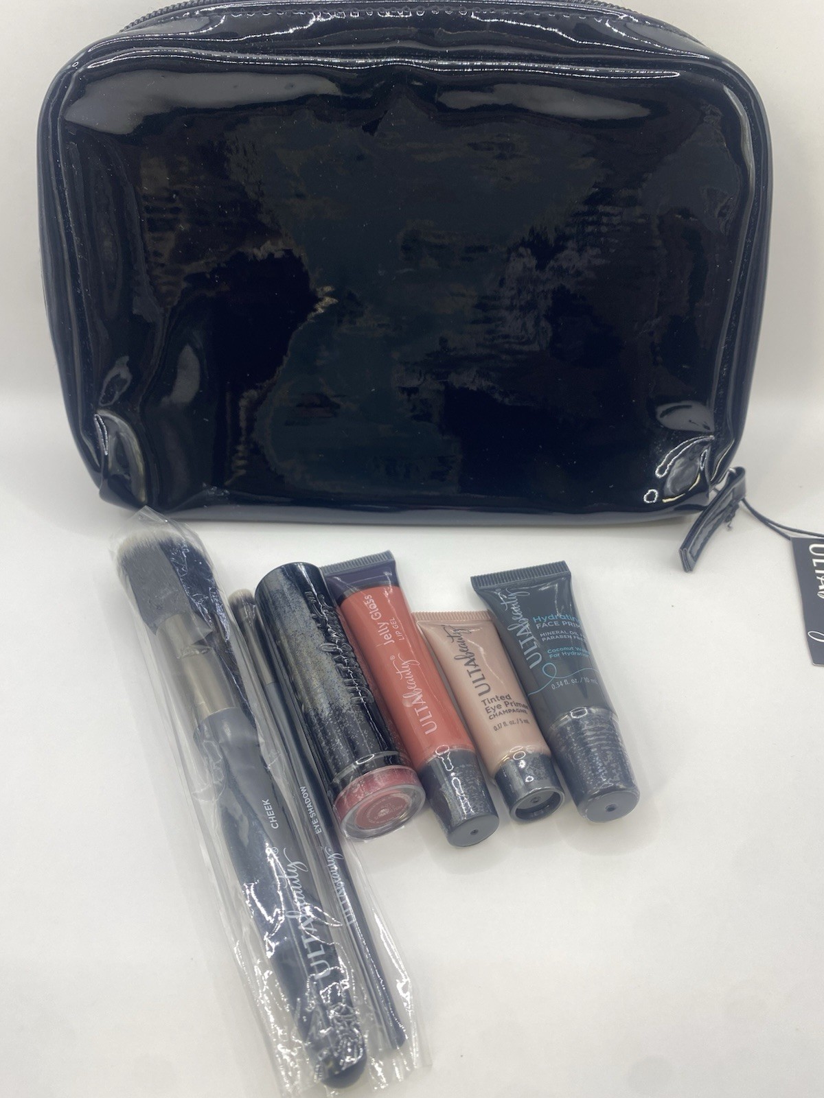 ULTA Beauty 7-Piece Makeup Lot Set w/ Cosmetic Bag Brushes Lipstick Primers