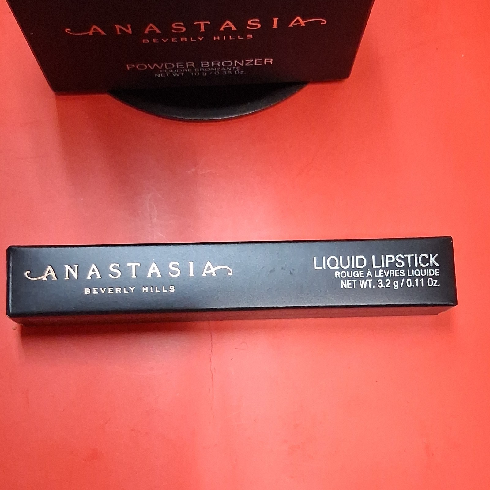 Anastasia Beverly Hills Lipstick Requiem, Highlighter Vegas, Bronzer Rich Amber