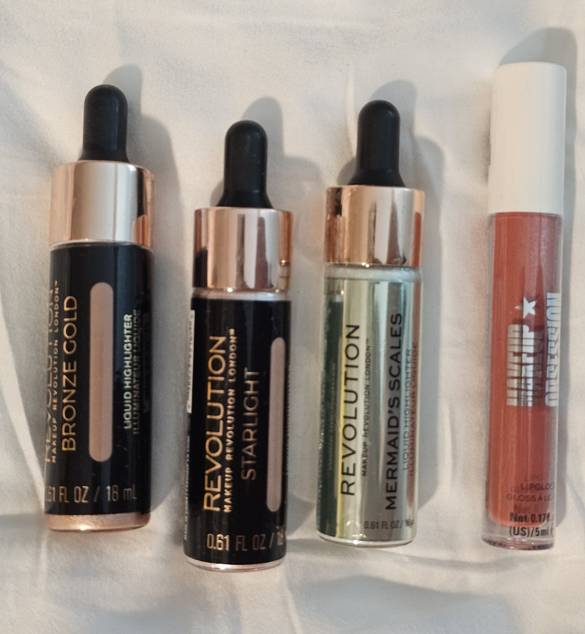 Makeup Revolution Liquid Highlighter & Lip Gloss Lot: Bronze Gold, Starlight