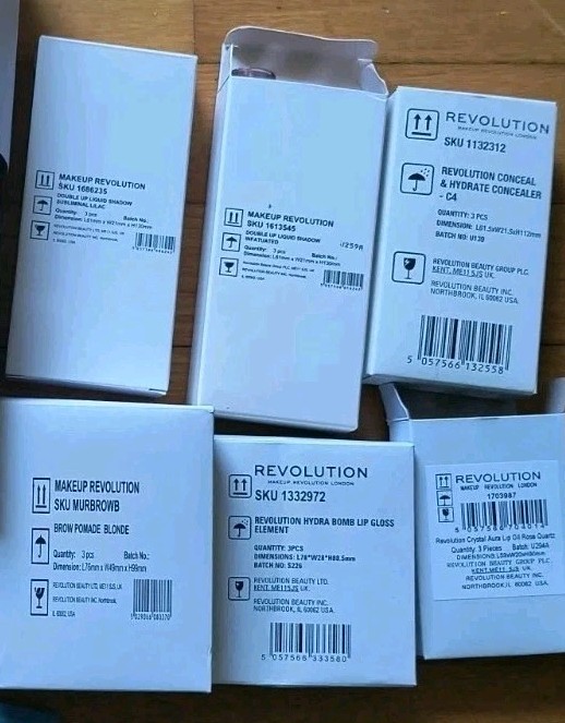 18 PC Casepack Makeup Revolution Cosmetics Lips Eyes Face Brow Pomade Concealer