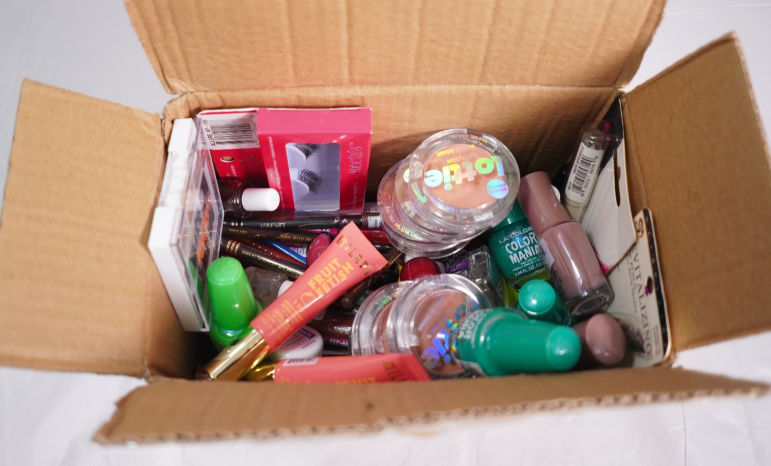 Mixed Makeup Lot with 62 Pieces: For Hair, Face, & Nails