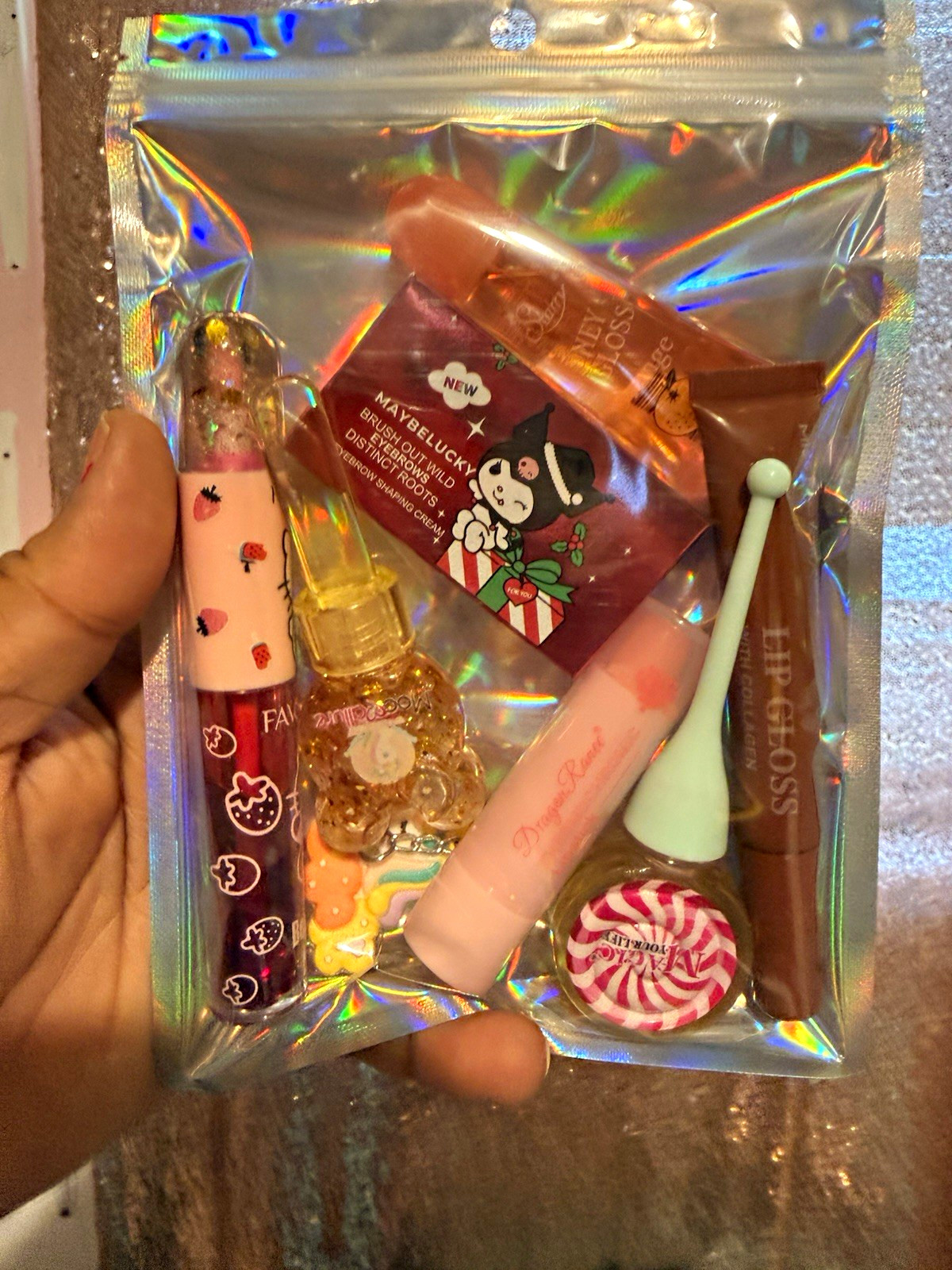 Assorted Travel Size Makeup Mixed Lot in Holographic Zip Pouch, Maybelucky