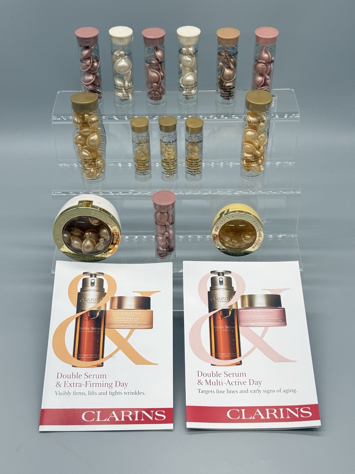 WHOLESALE LOT OF 119 CAPSULES ELIZABETH ARDEN / CLARINS PARIS BEAUTY PRODUCTS