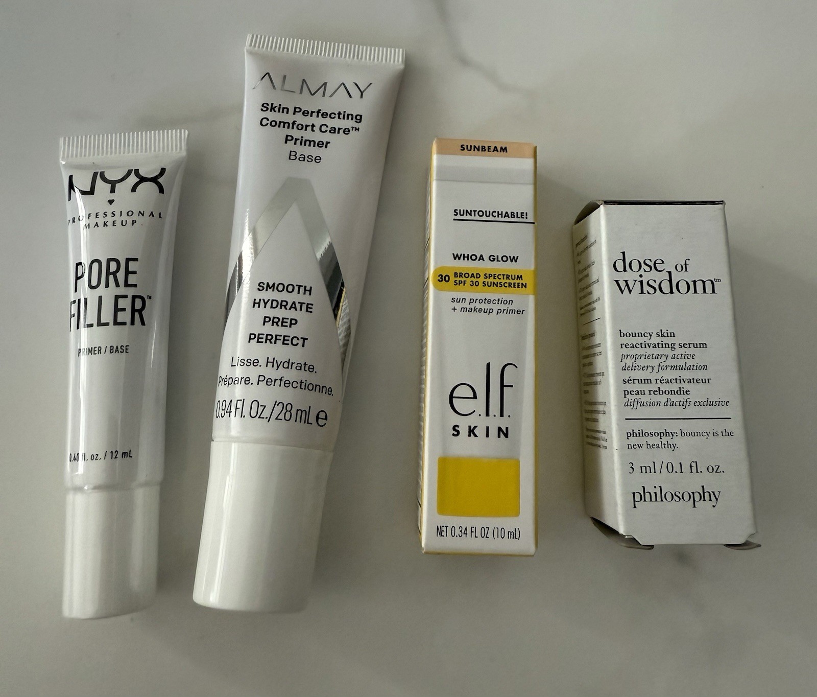 Almay Primer, Nyx Pore Filler , Elf Sunscreen & Philosophy Dose Of Wisdom