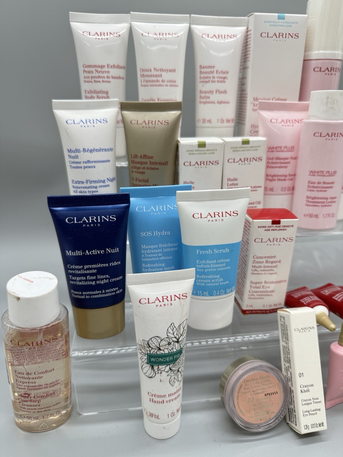 WHOLESALE LOT OF 55 MIXED/ASSORTED CLARINS PARIS BEAUTY PRODUCTS