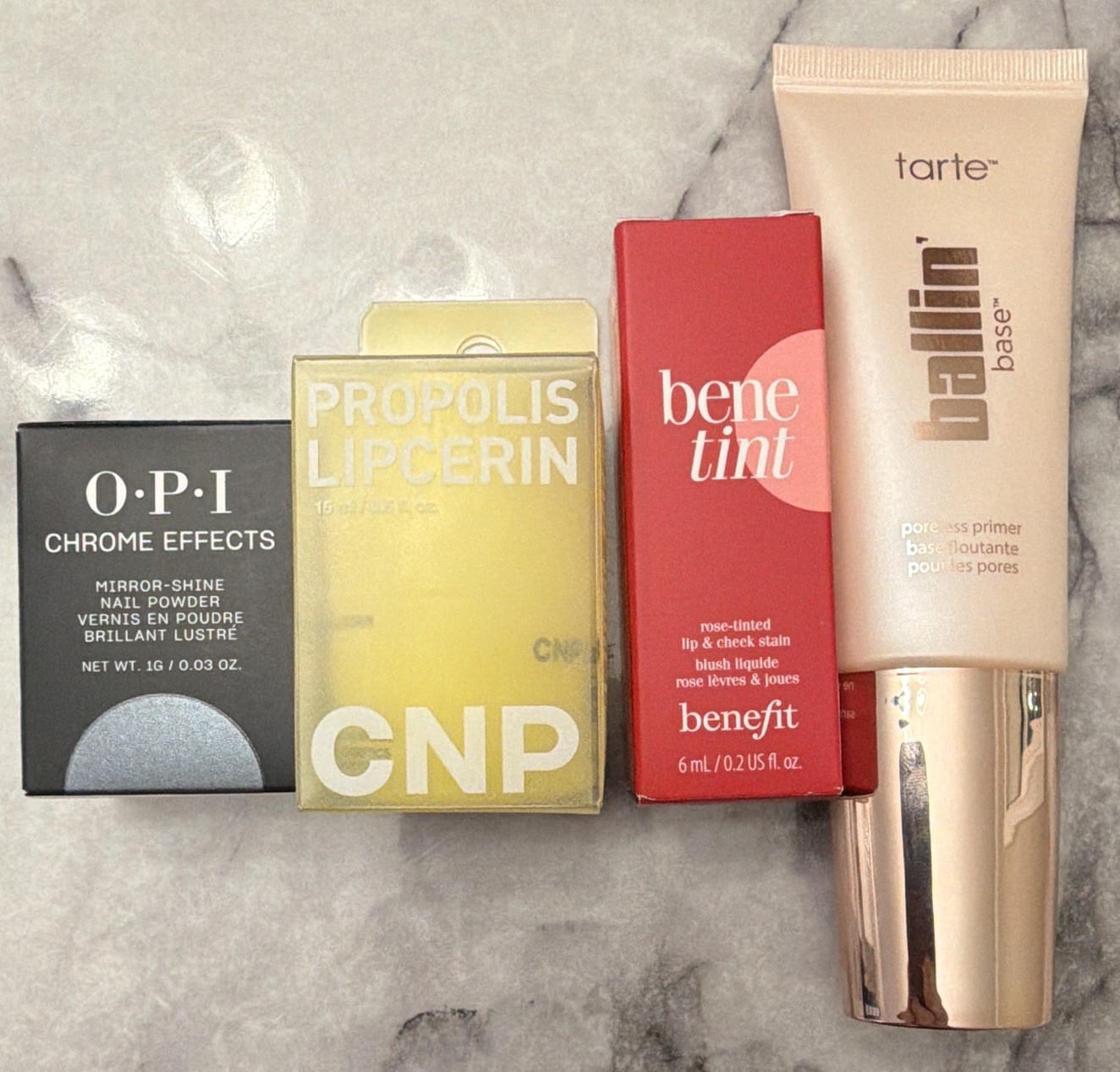 Assorted Makeup Lot: OPI Chrome Effects, CNP Lipcerin, Benetint, Tarte Base
