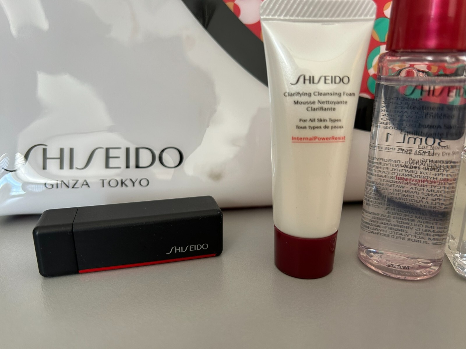 Mixed Lot 6 Shiseido Mini Travel Samples & Cosmetic Bag, Cologne, Serum, Lotion