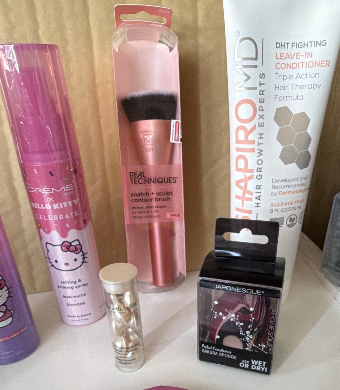 Assorted Makeup & Beauty Lot: Hello Kitty Palette, Brush, Hair Growth Therapy