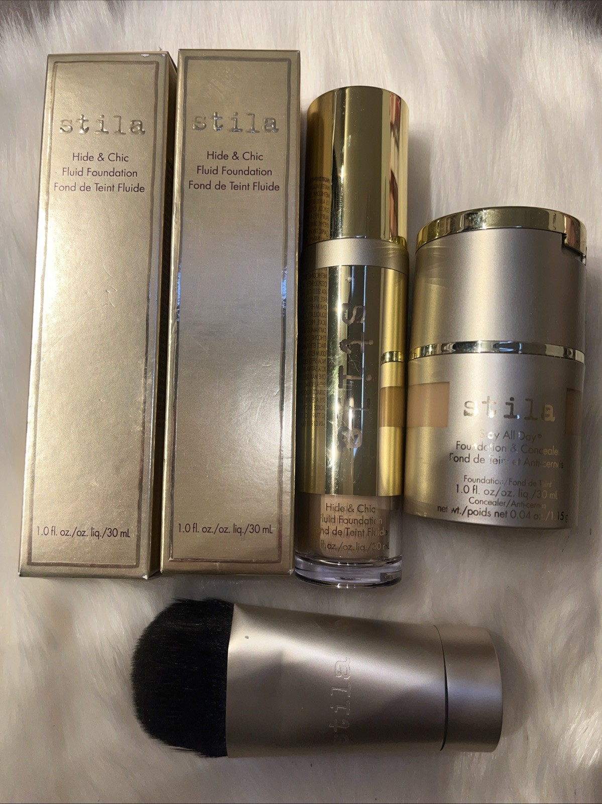mixed make up lot Stila: Foundation, Concealer, Brush CHECK DESCRIPTION