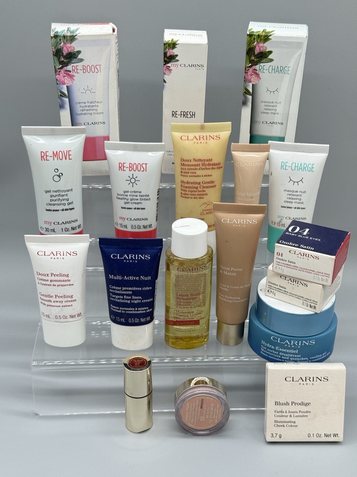 WHOLESALE LOT OF 63 MIXED/ASSORTED CLARINS PARIS BEAUTY PRODUCTS