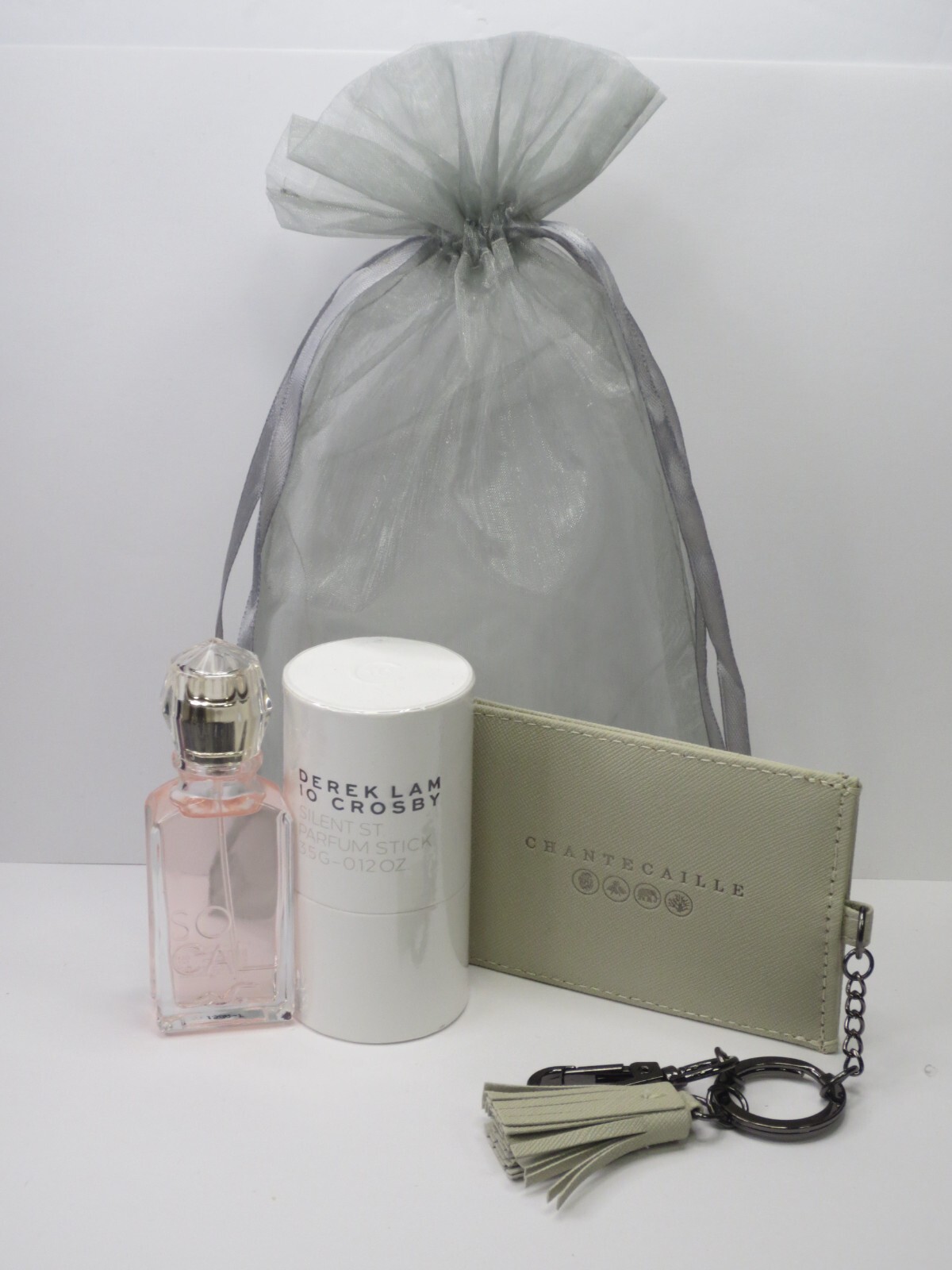 ASSORTED TRAVEL ESSENTIALS – PARFUM STICK, EAU DE PARFUM & MIRROR KEYCHAIN