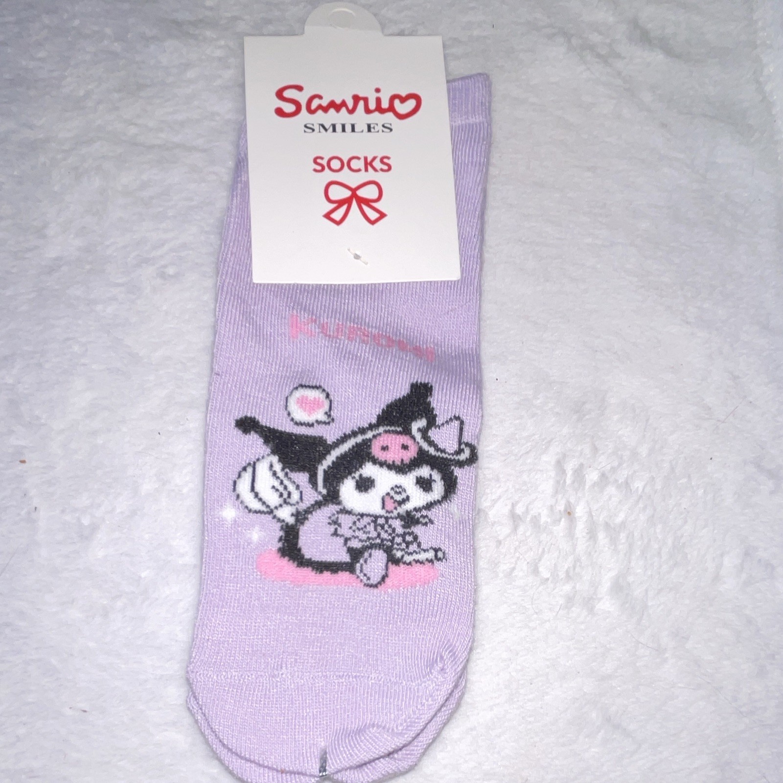 The Crème Shop Beauty Lot: Rose Water Mask, Eyeliner, Kuromi Socks, lip gloss