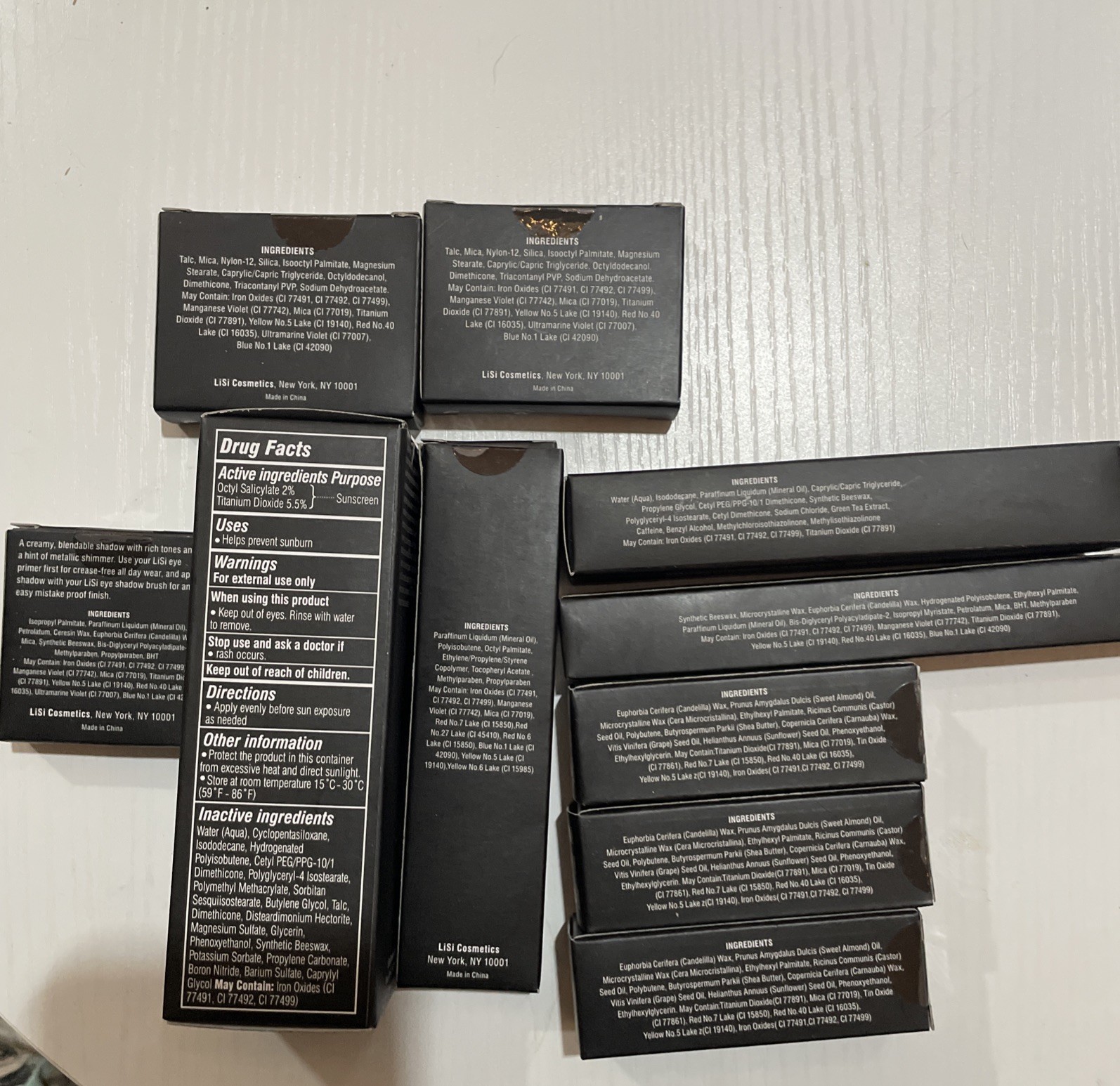 Bundle of 10 Lisi Cosmetics Lip Stick, Foundation, Eye Shadow Makeup Set Lot