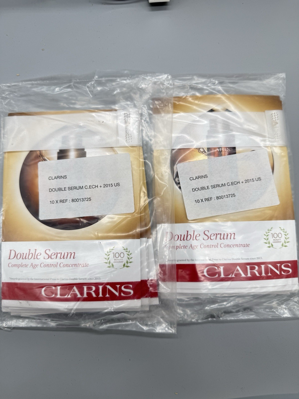 WHOLESALE LOT OF 55 MIXED/ASSORTED CLARINS PARIS BEAUTY PRODUCTS