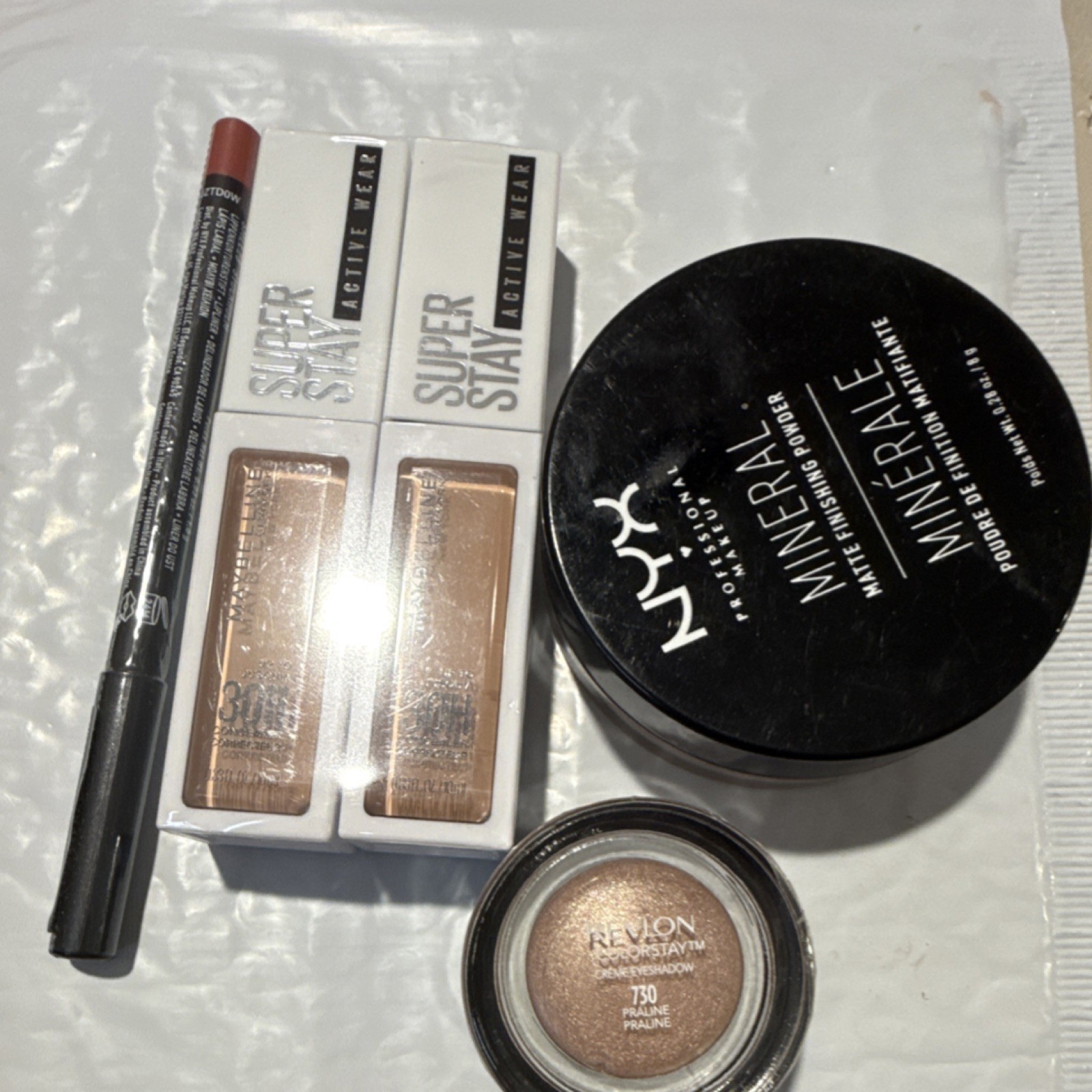 Maybelline Super Stay Concealer, NYX Mineral Powder, Revlon ColorStay Eyeshadow