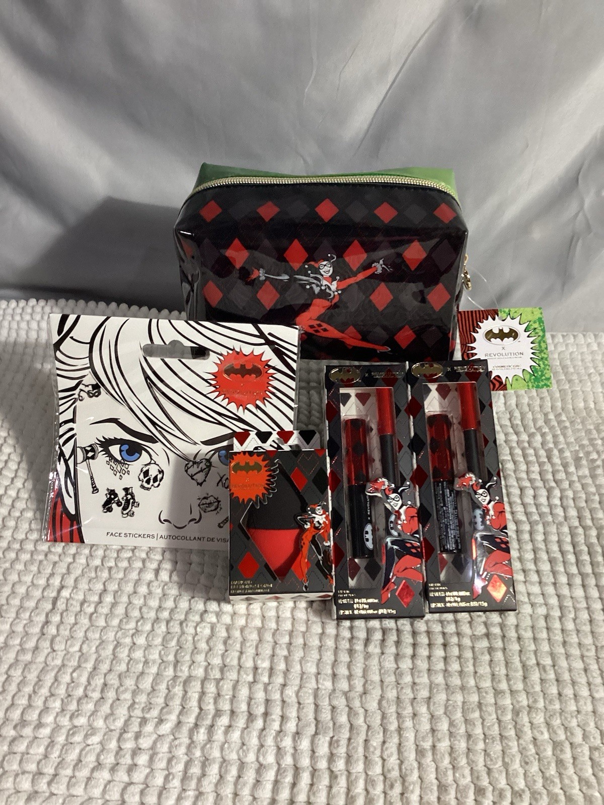 Revolution x DC Harley Quinn 5pc Lot; Cosmetic Bag, Sponge, 2 Lip Kits & Sticker