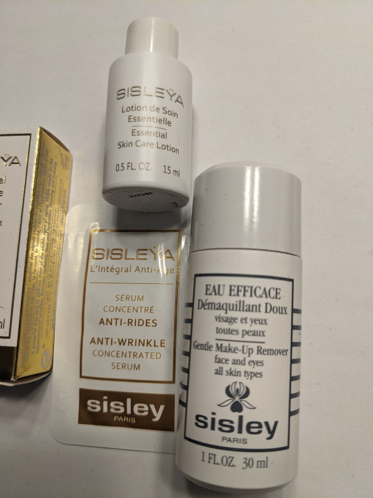 QTY 9 Sisley sample set, L’Integral Anti-age , serum & Winter 2025 make up bag