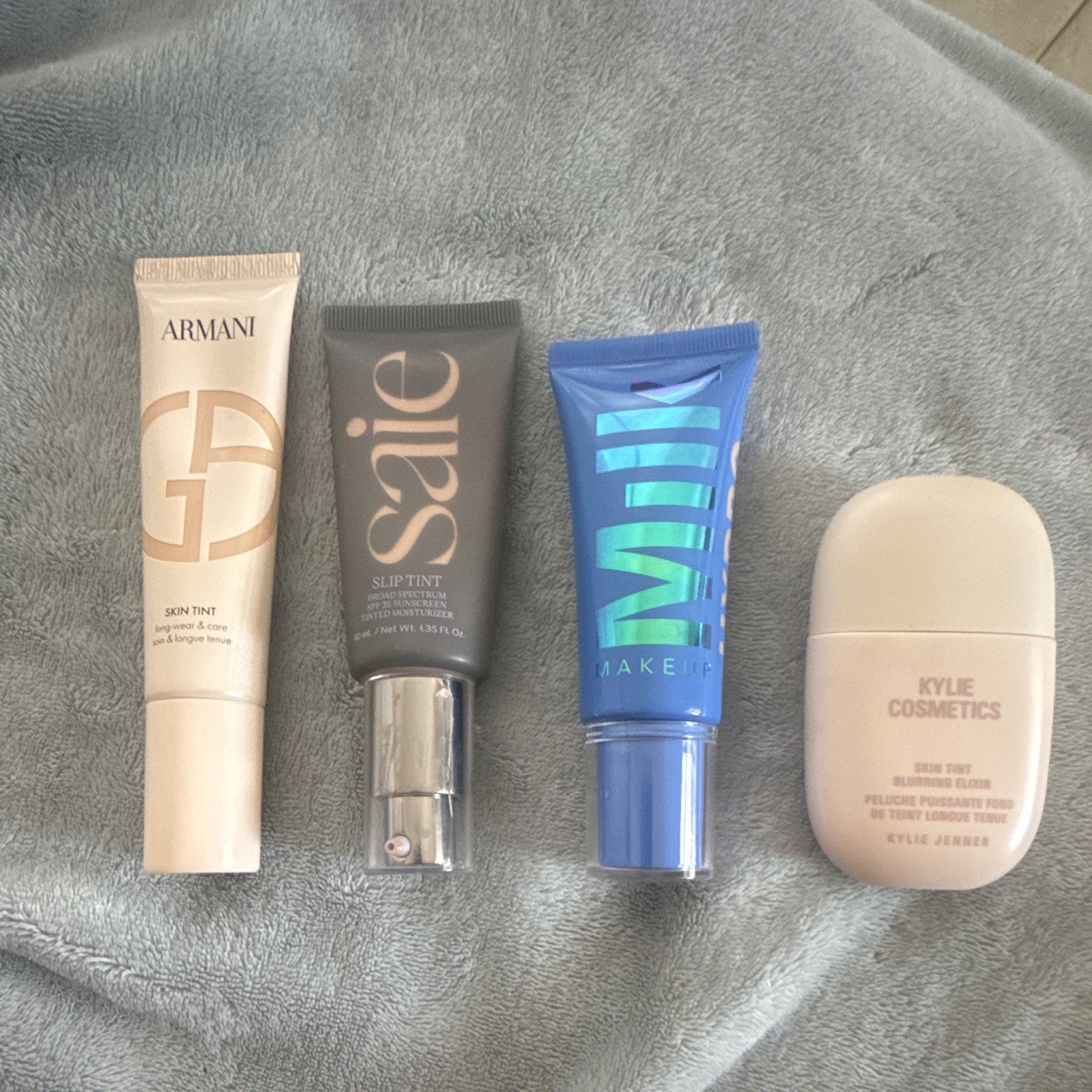 Mixed Brands Vegan Skin Tint & Foundation Lot: Armani, Saie Slip Tint, Milk Grip