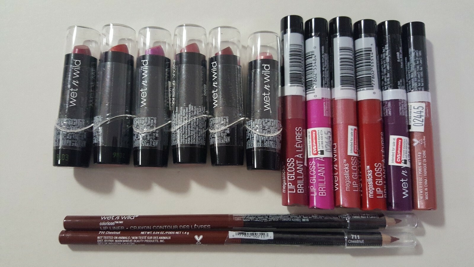 NIP: 14 piece lot of Wet N Wild Lip Products; 6 lipsticks/ 6 glosses/ 2 pencils