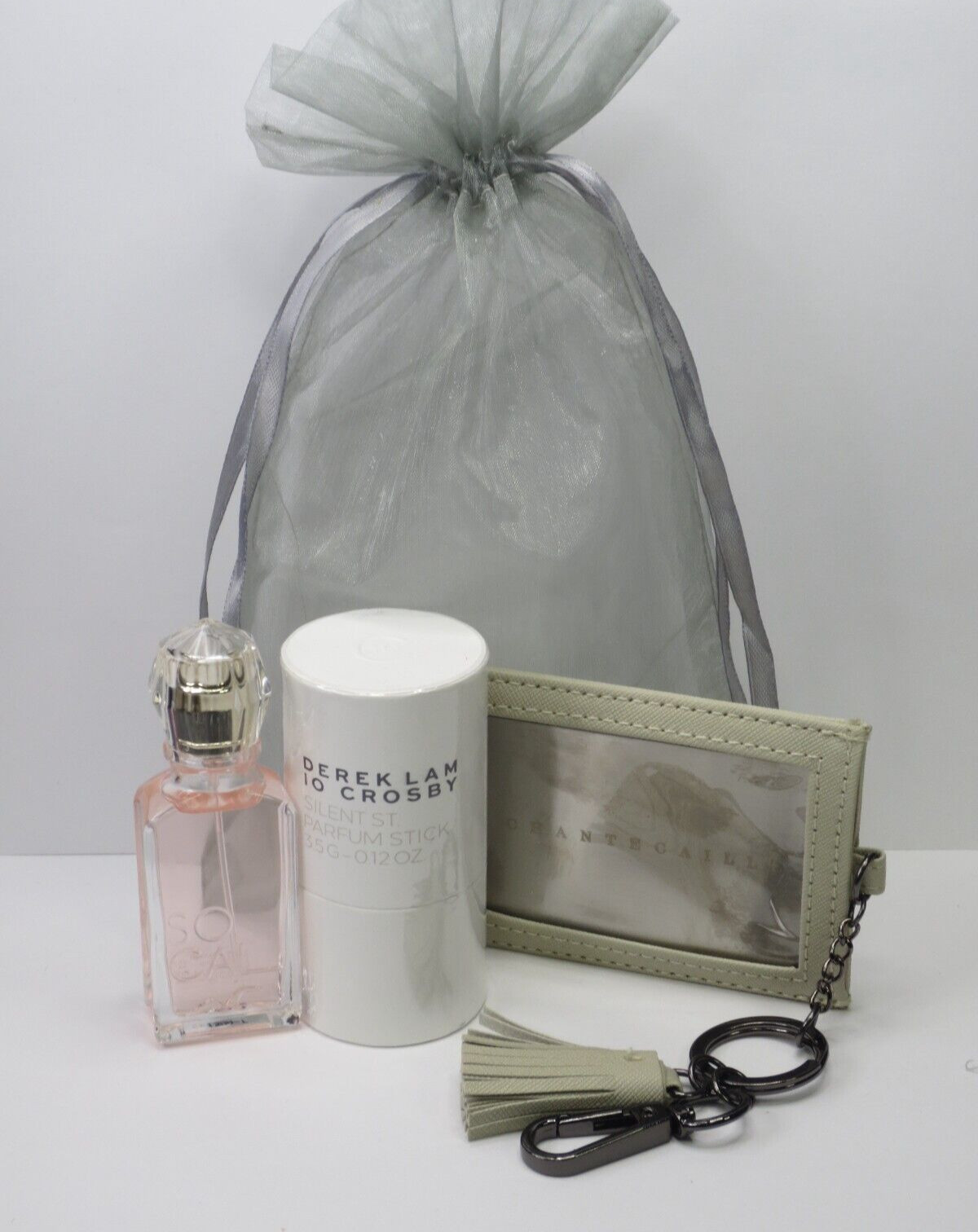 ASSORTED TRAVEL ESSENTIALS – PARFUM STICK, EAU DE PARFUM & MIRROR KEYCHAIN