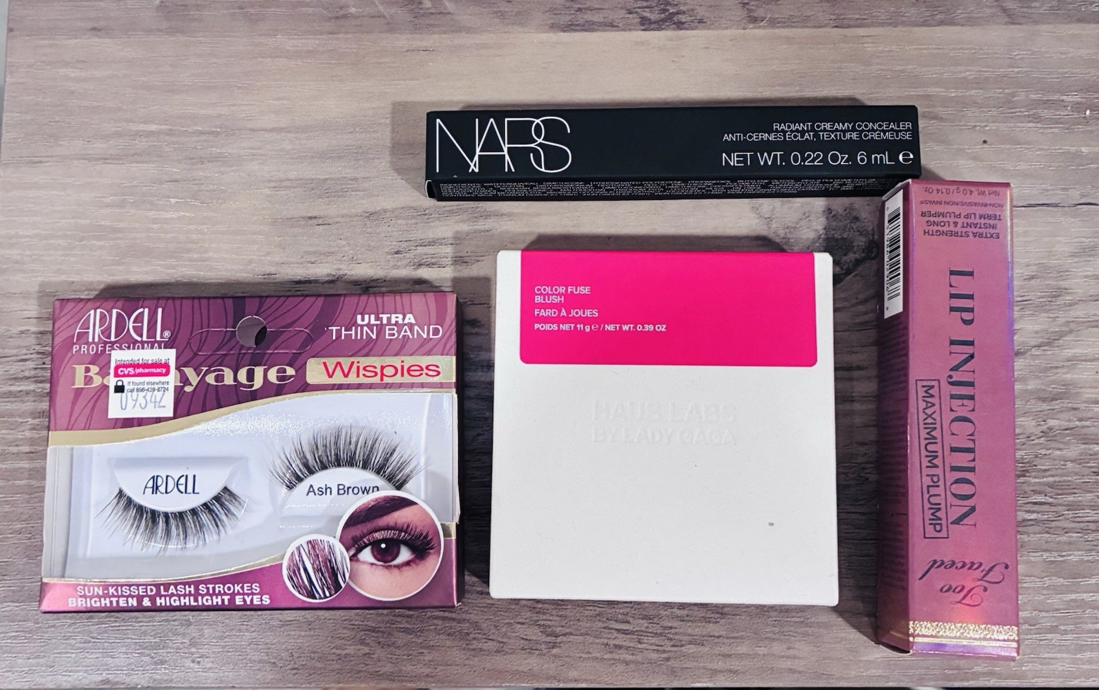 Ardell Wispies, NARS Concealer, Haus Labs Blush, Too Faced Lip Lot