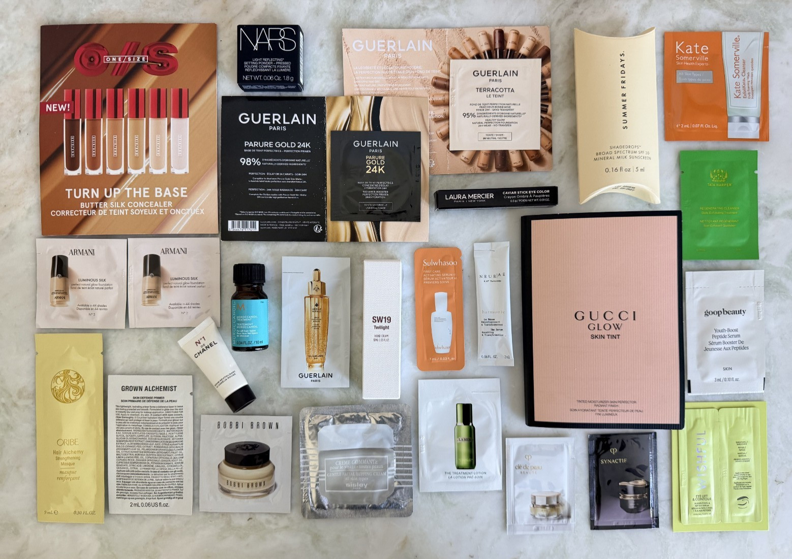 26 Piece Luxury Beauty Lot Gucci Chanel La Mer Sisley Cle de Peau Guerlain Oribe