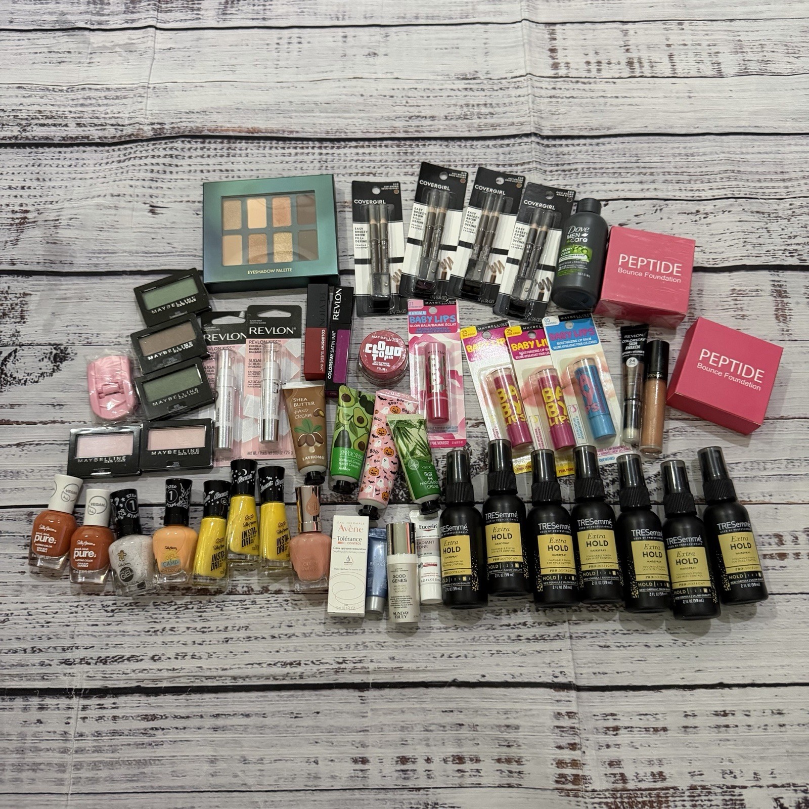 HUGE LOT OF MAKE UP AND TRAVEL SIZE ITEMS MAYBELLINE COVERGIRL TRESEMME