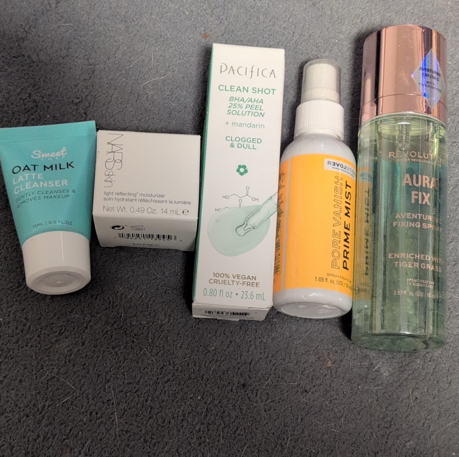 Sweet Oat Milk Cleanser, NARS Moisturizer, Pacifica Peel, Revolution Spray