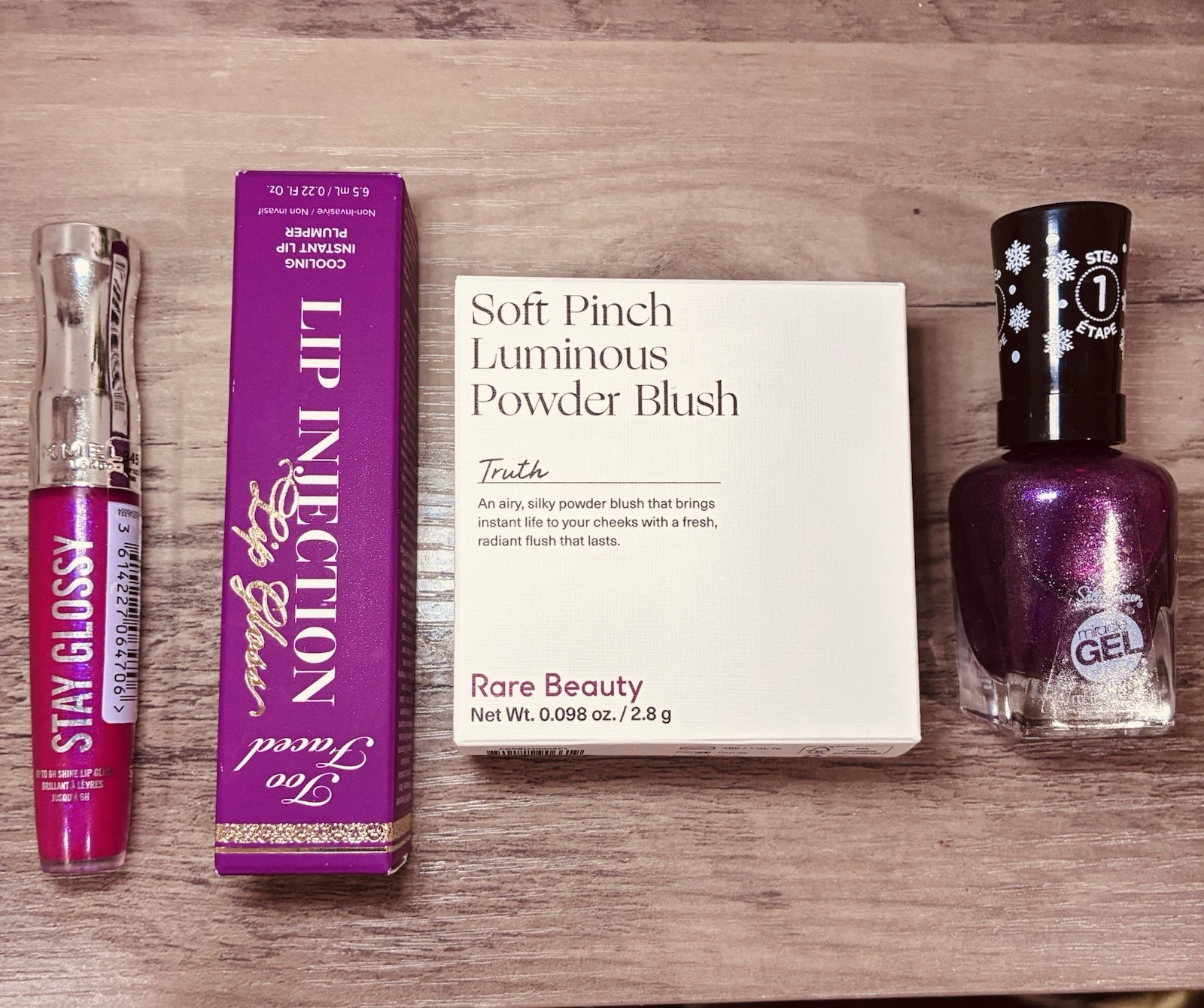 Rimmel Lip Gloss, Too Faced Lip Injection, Rare Beauty Blush, Sally Hansen Gel …